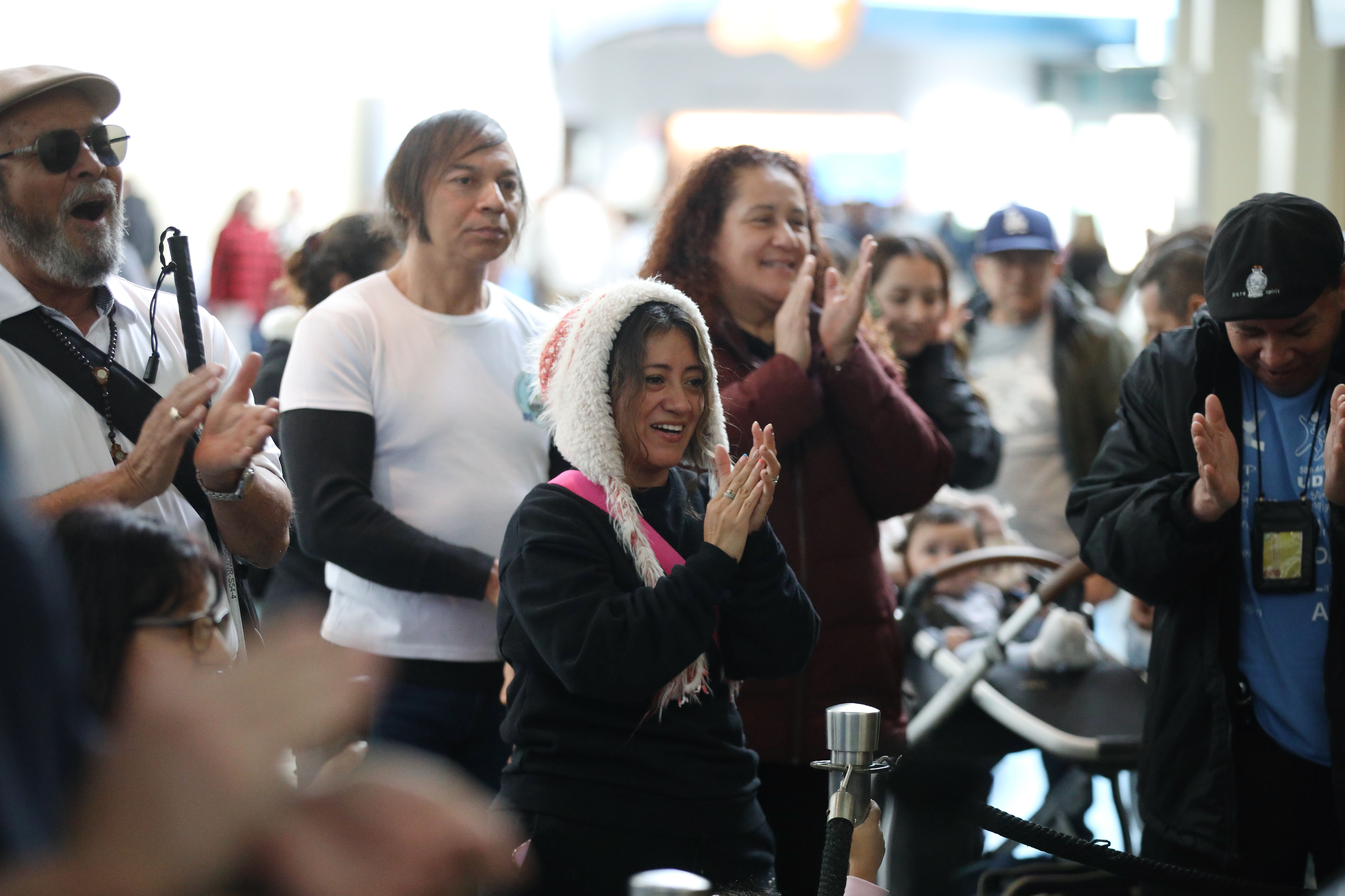 Attendees applaud a musical performance at the 23rd annual Festival...