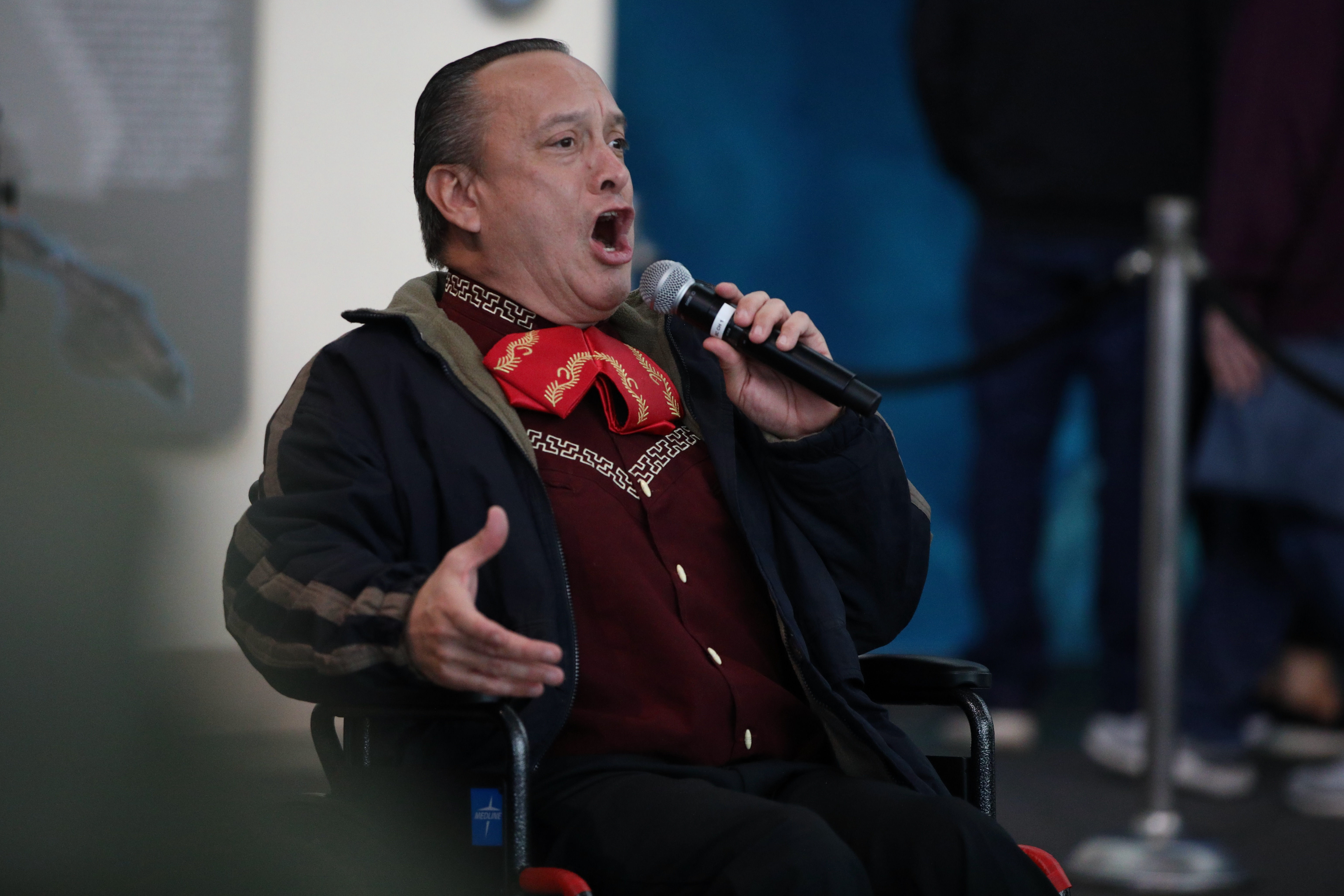 Guillermo Gomez of the Unification of Disabled Latin Americans belts...
