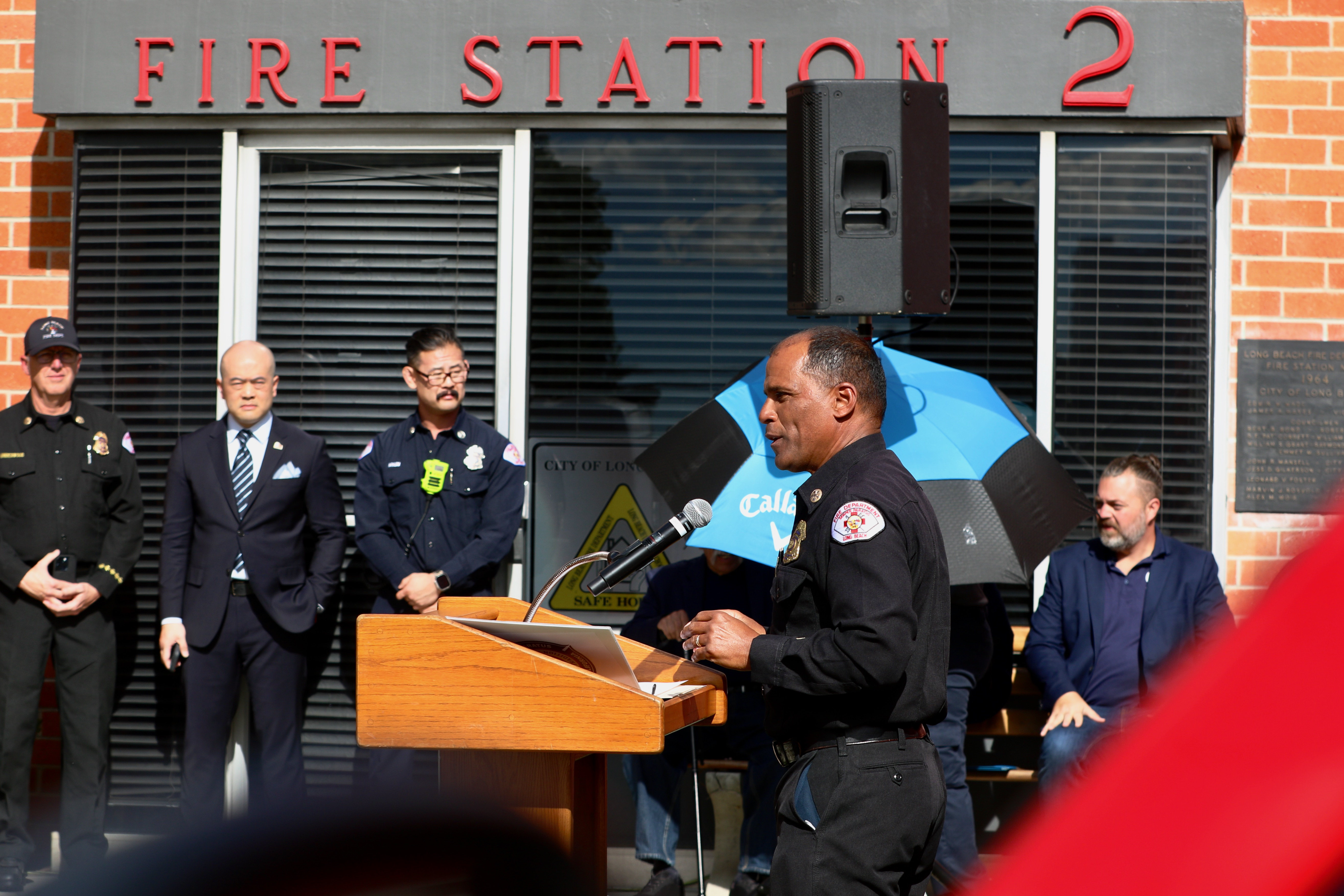 City leaders and firefighters join Long Beach Fire Chief Dennis...