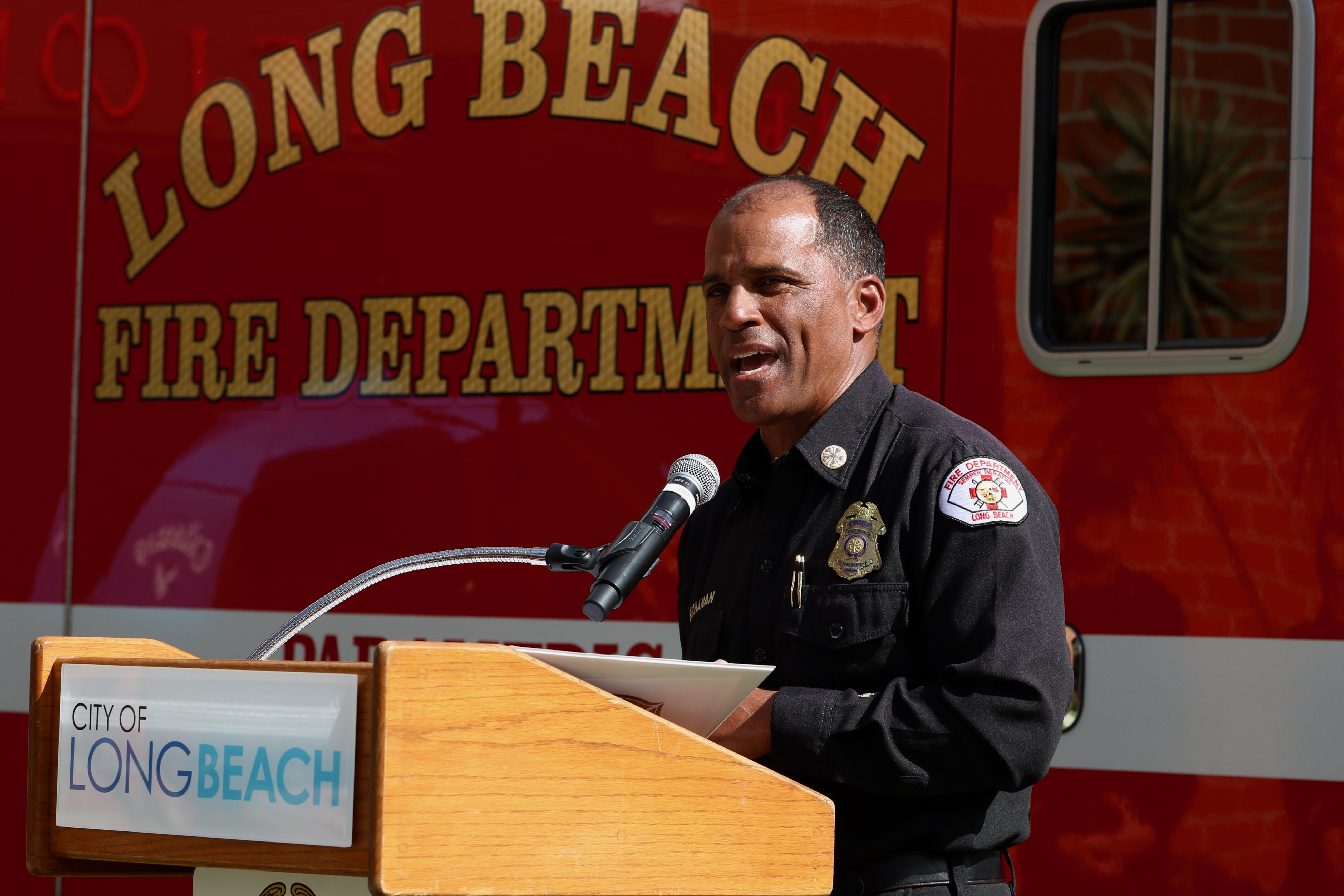 Long Beach Fire Chief Dennis Buchanan speaks at Fire Station...