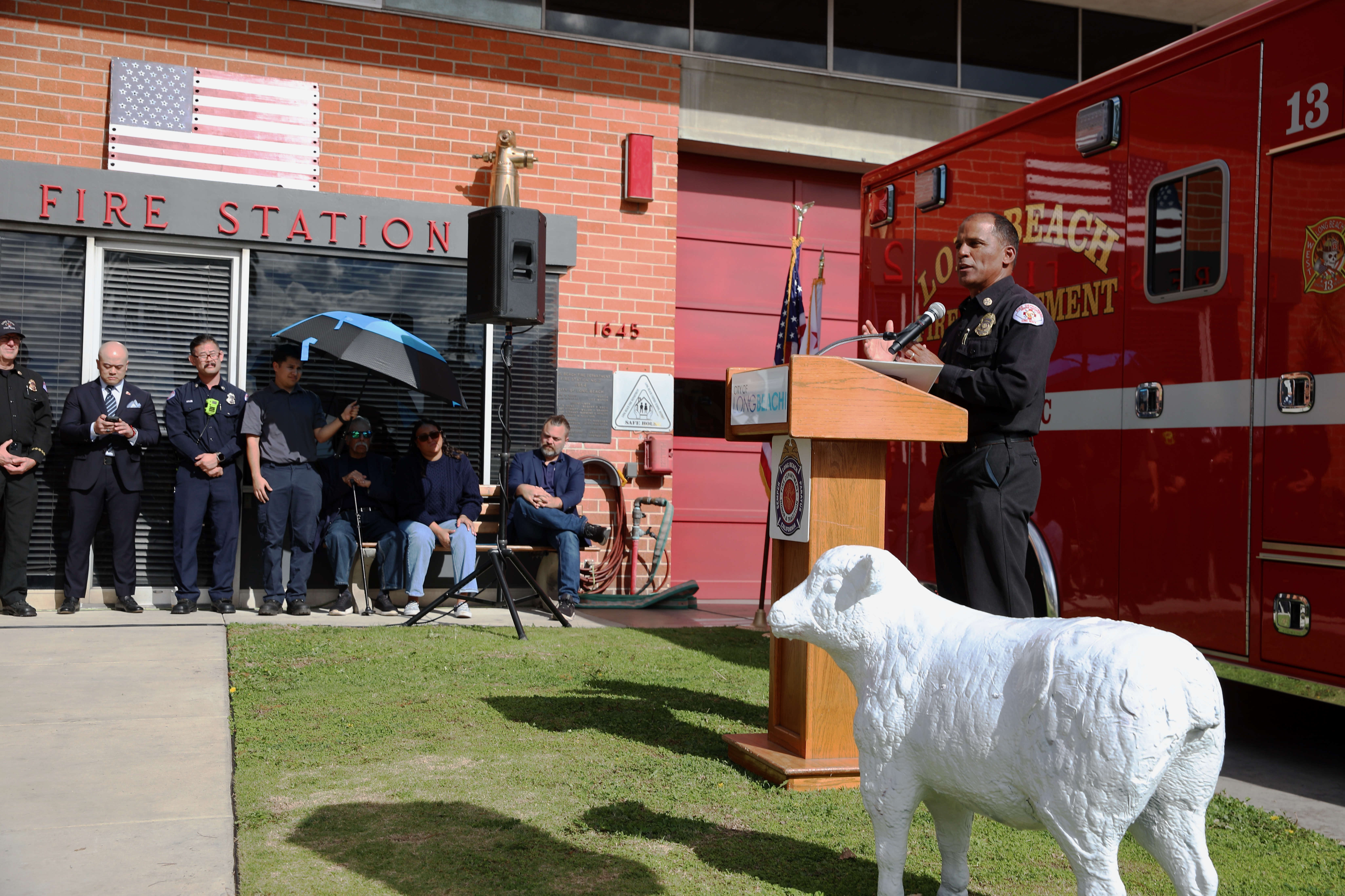 City leaders and firefighters join Long Beach Fire Chief Dennis...