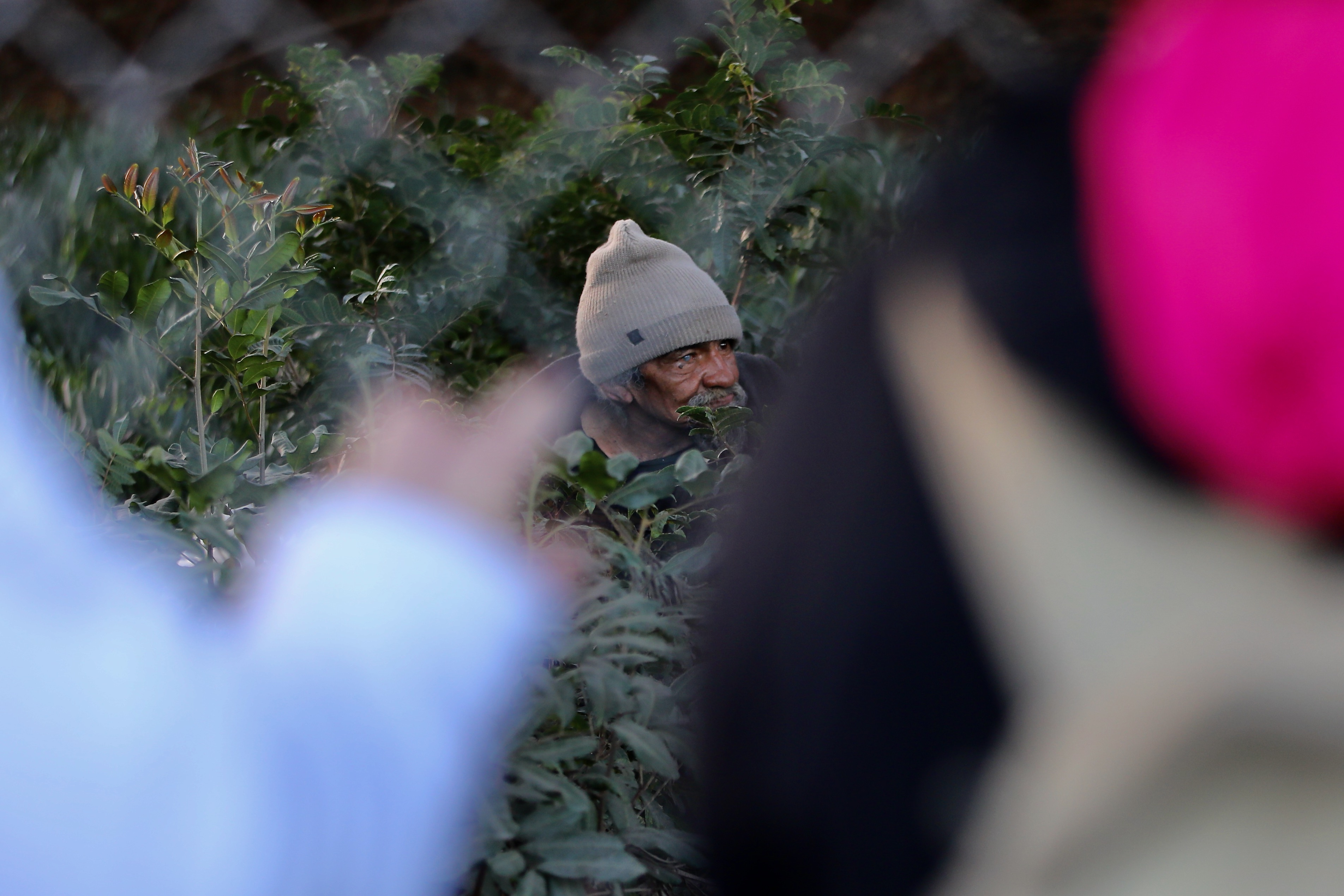 Volunteers from the Long Beach VA unsuccessfully try to query...
