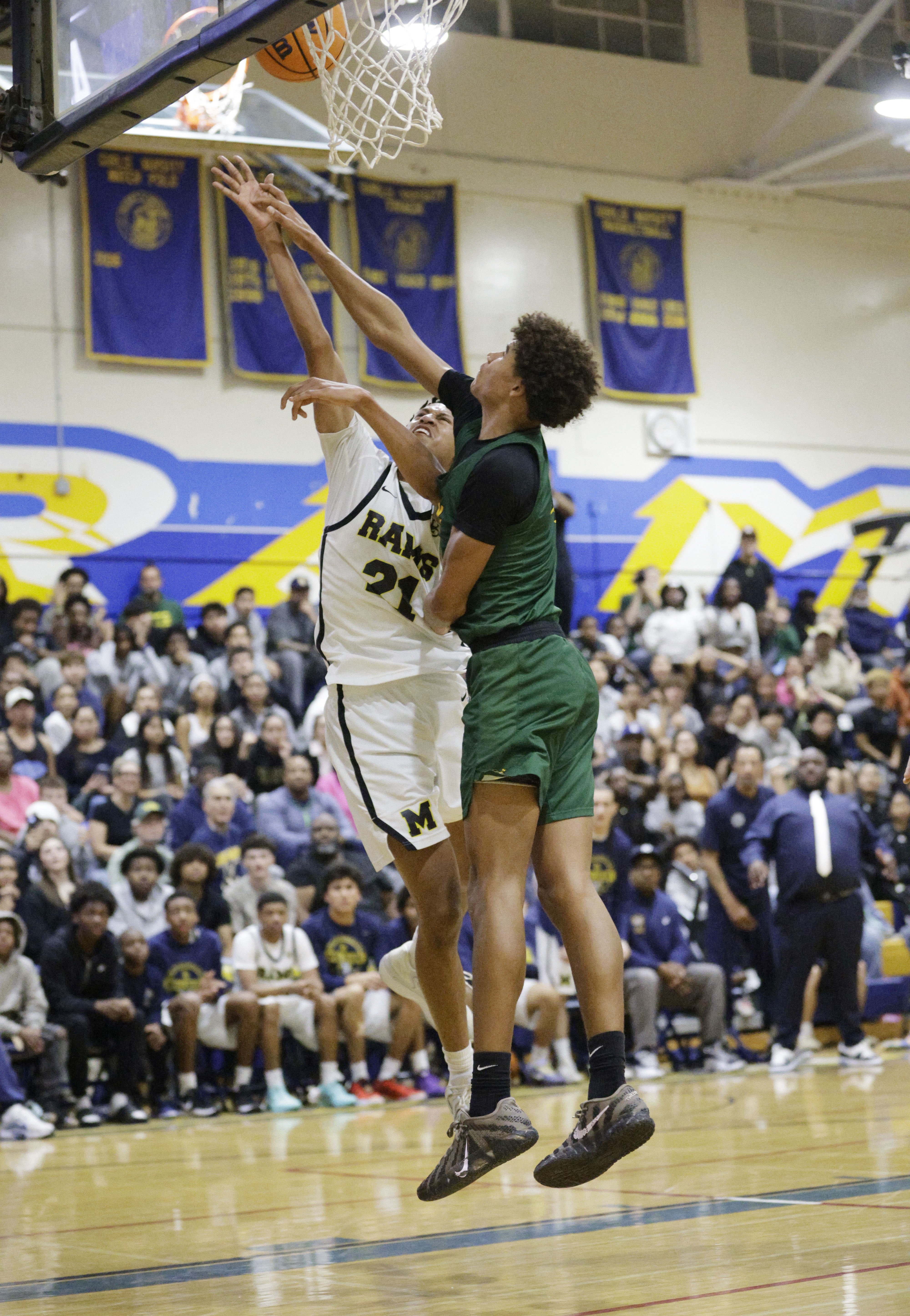 Long Beach Poly’s Jakobi Oware (4) tries to block the...