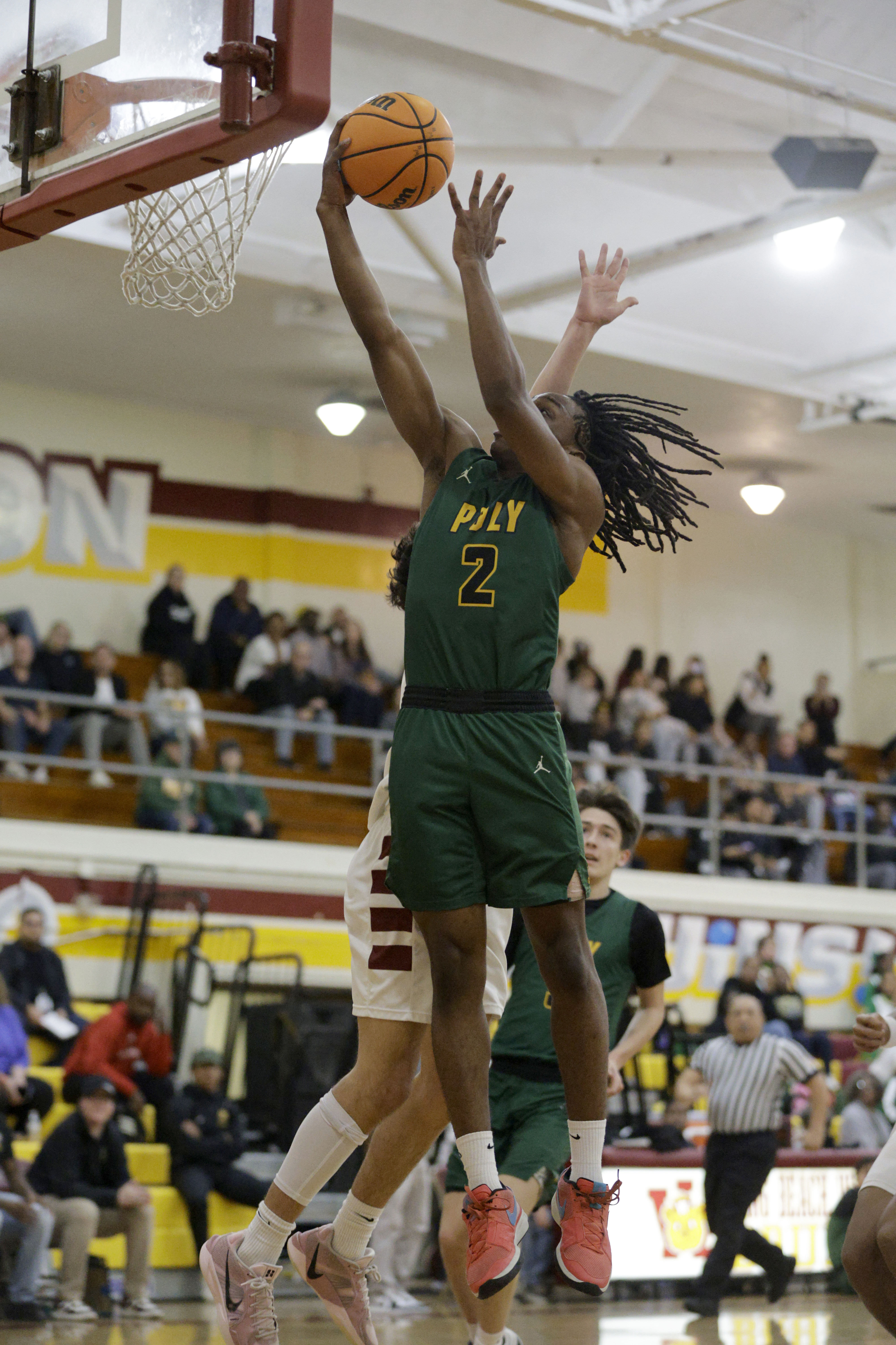 Long Beach Polys Nana Ofoegbu (2) goes up for the...