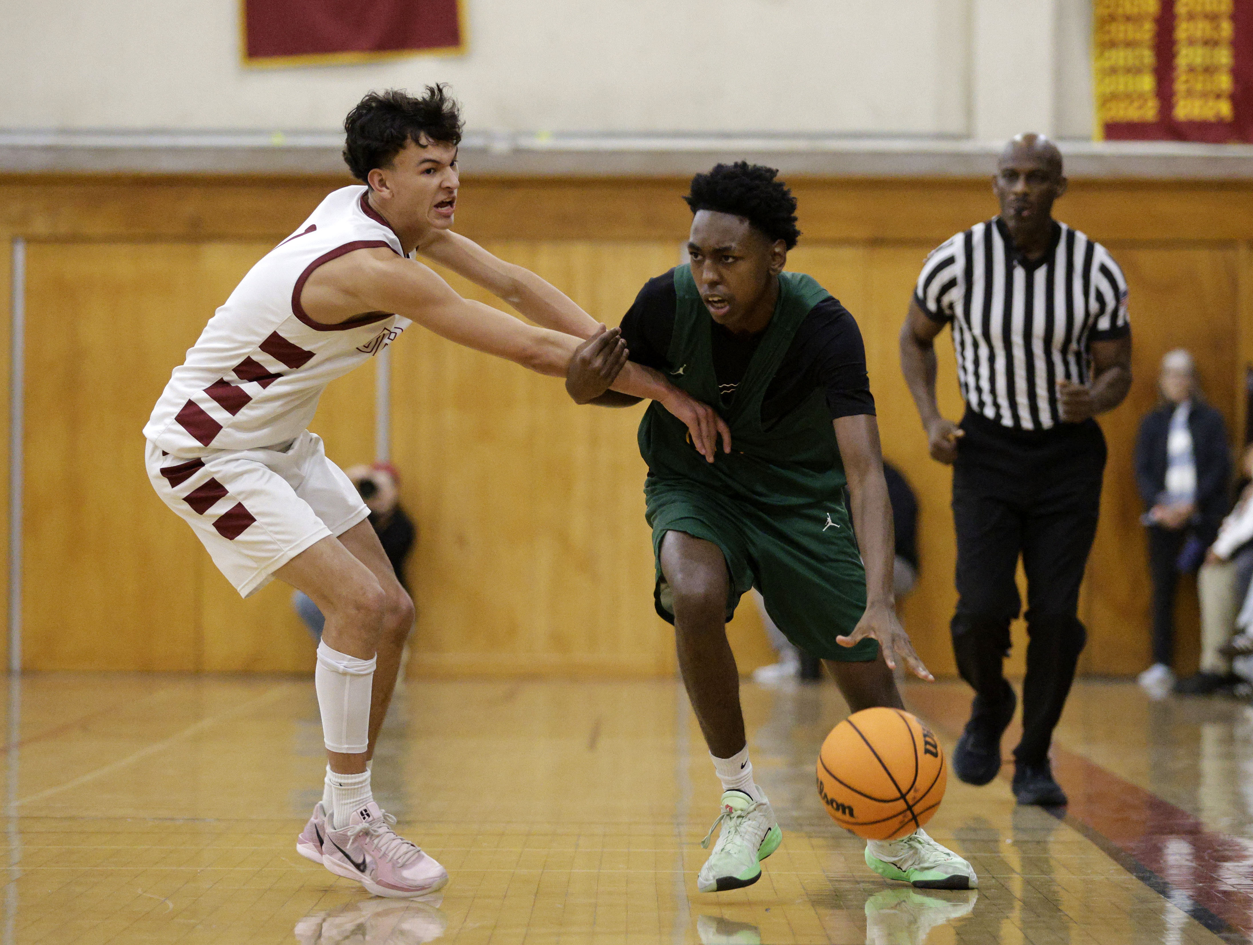 Long Beach Polys Jayden Ganther (24) tries to get past...