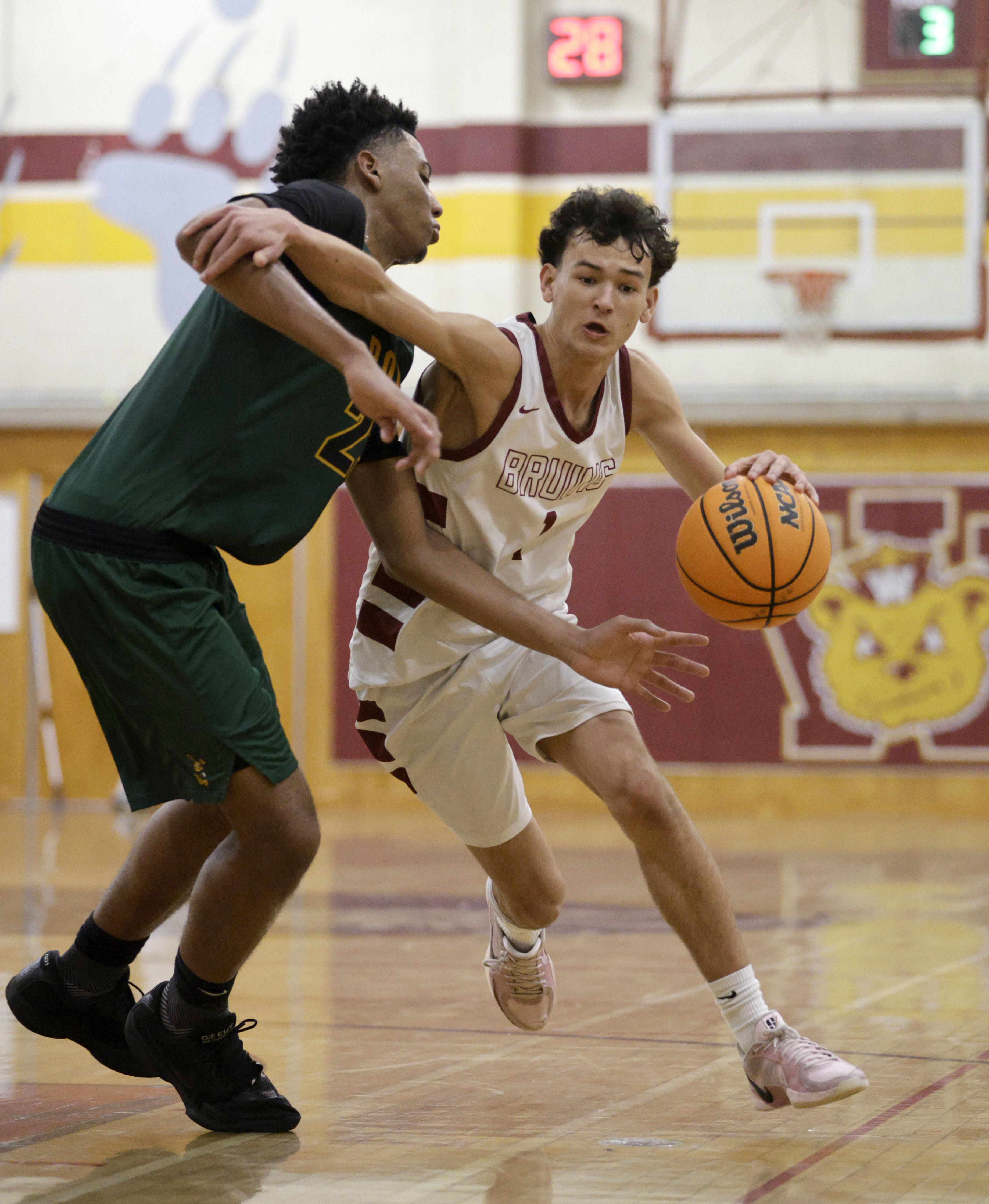 Wilsons Matthew Searles (1) looks to get past Long Beach...