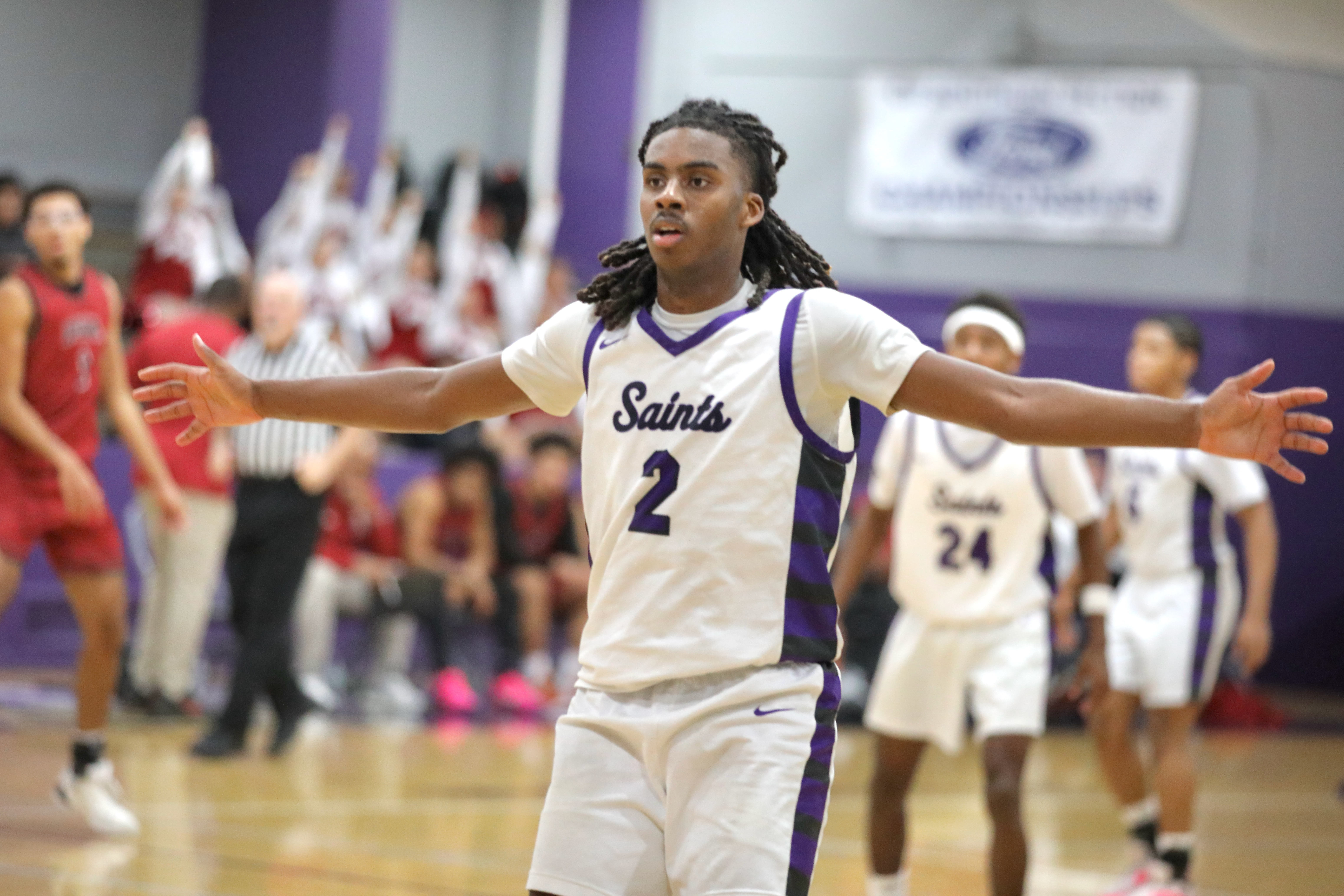 St. Anthony junior Tylan Kinsey reacts after hitting a fourth...