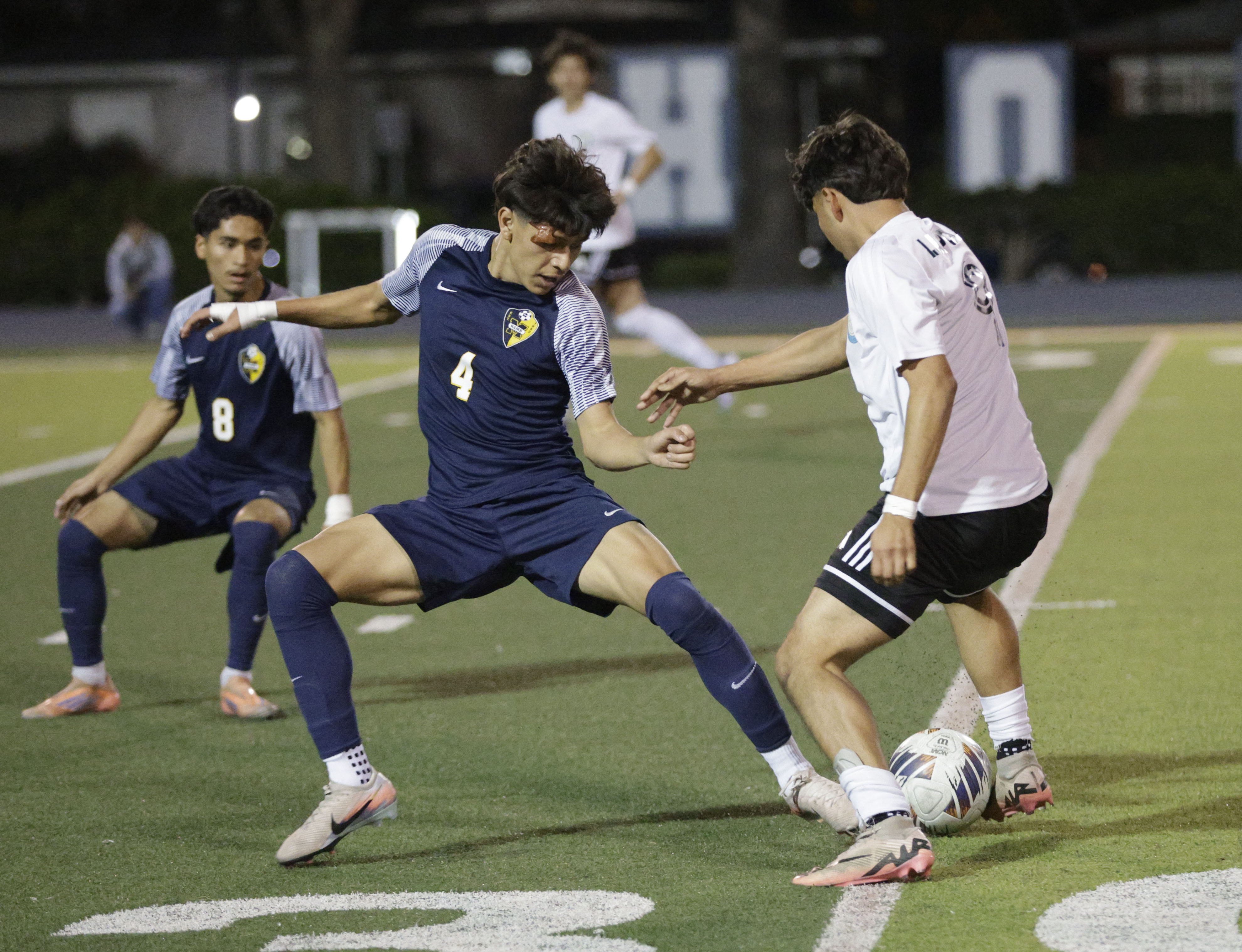 Long Beach Poly’s Alfaro Salvador (9) and Millikan’s Ivan Cervantes...