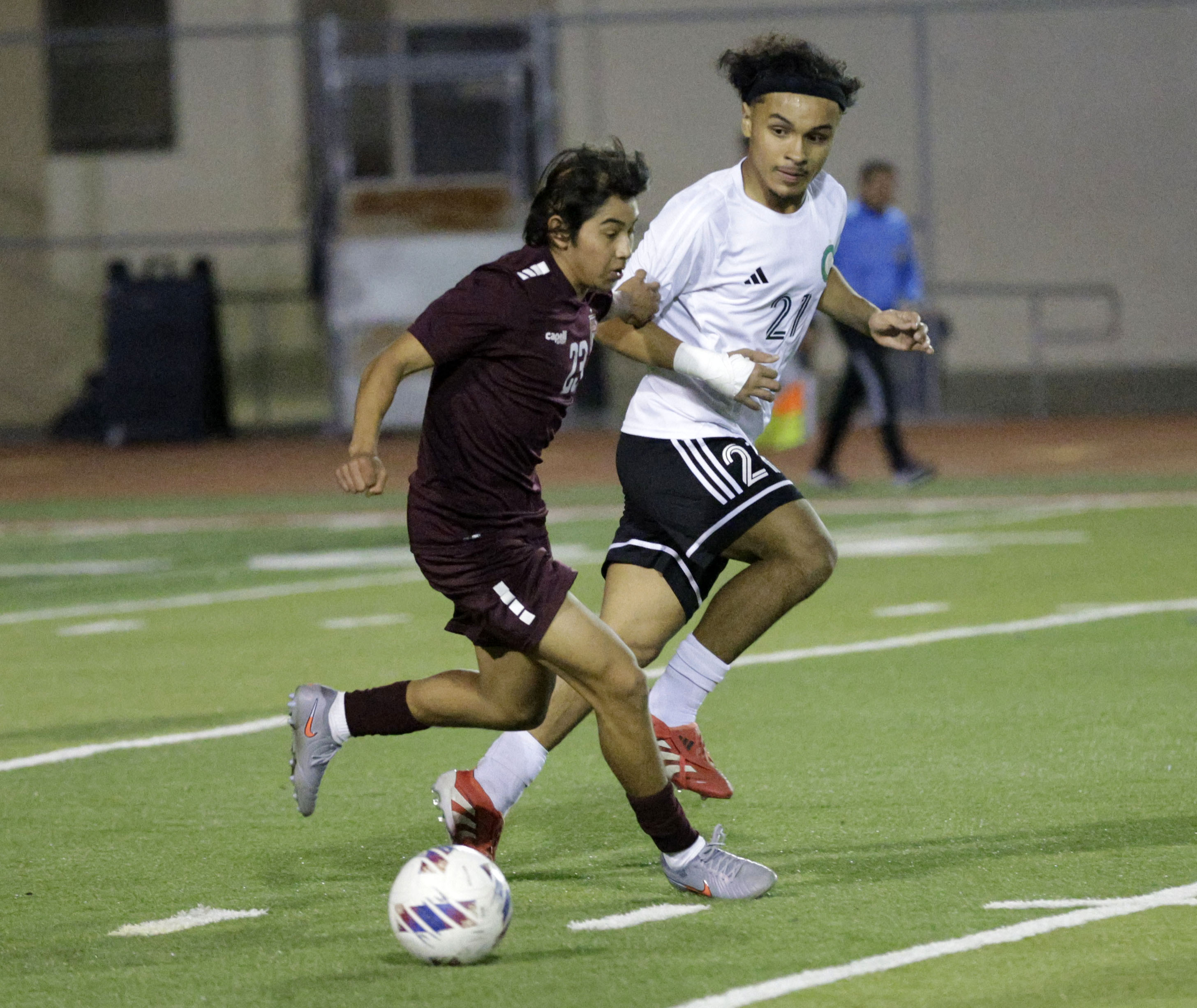 Wilson’s Noah Baleto (23) tries to keep the ball from...