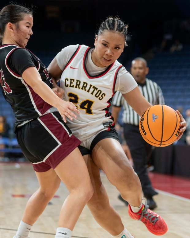 Cerritos' Madelyn Macaraeg drives by Mark Keppel's Keira Kamida during their Div. 3AA final game at the Toyota Arena in Ontario CA on Friday, Feb. 28, 2025. (James Quigg, Contributing Photographer)