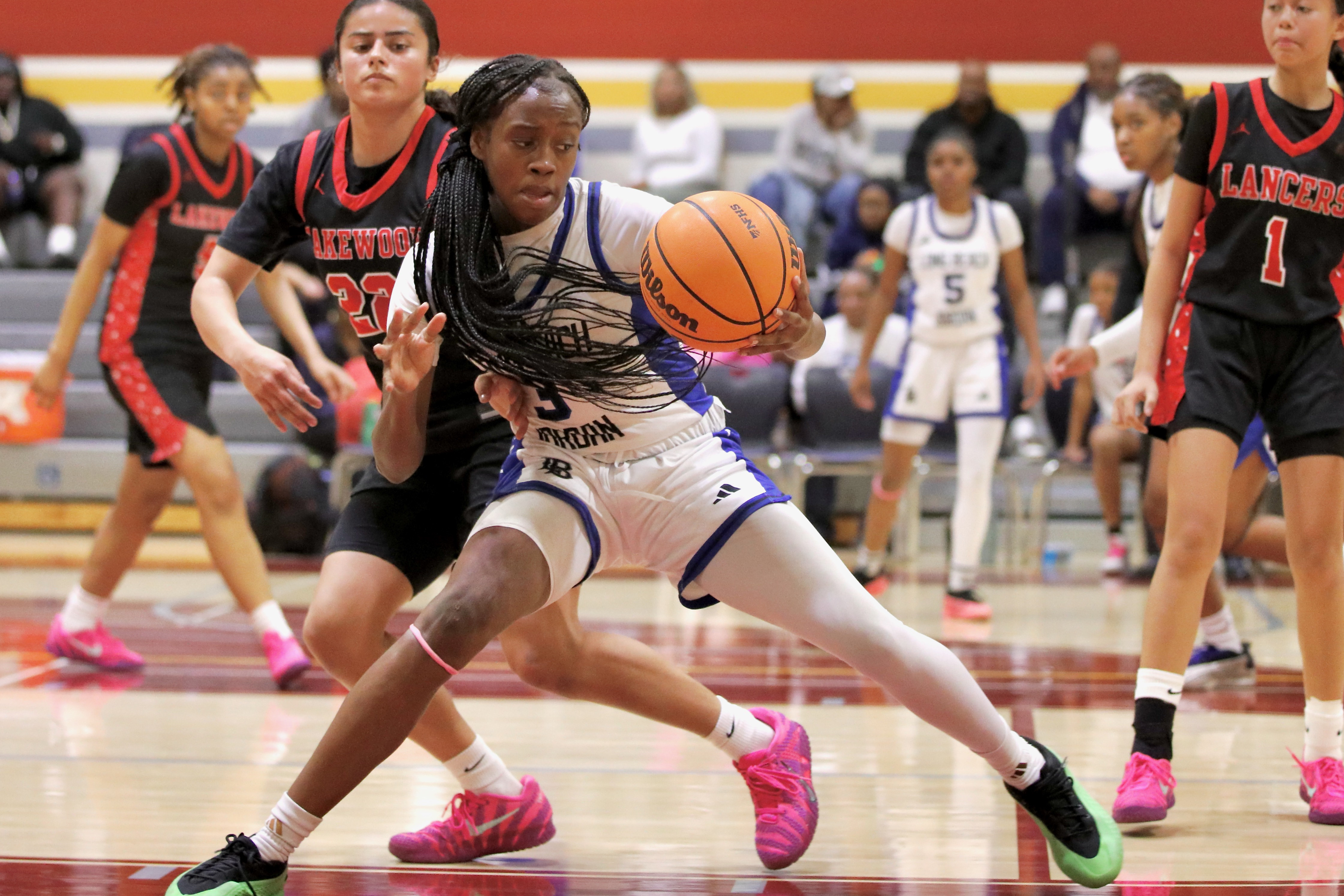 Jordan senior Jahâasharee Moore drives down the lane against Lakewood...