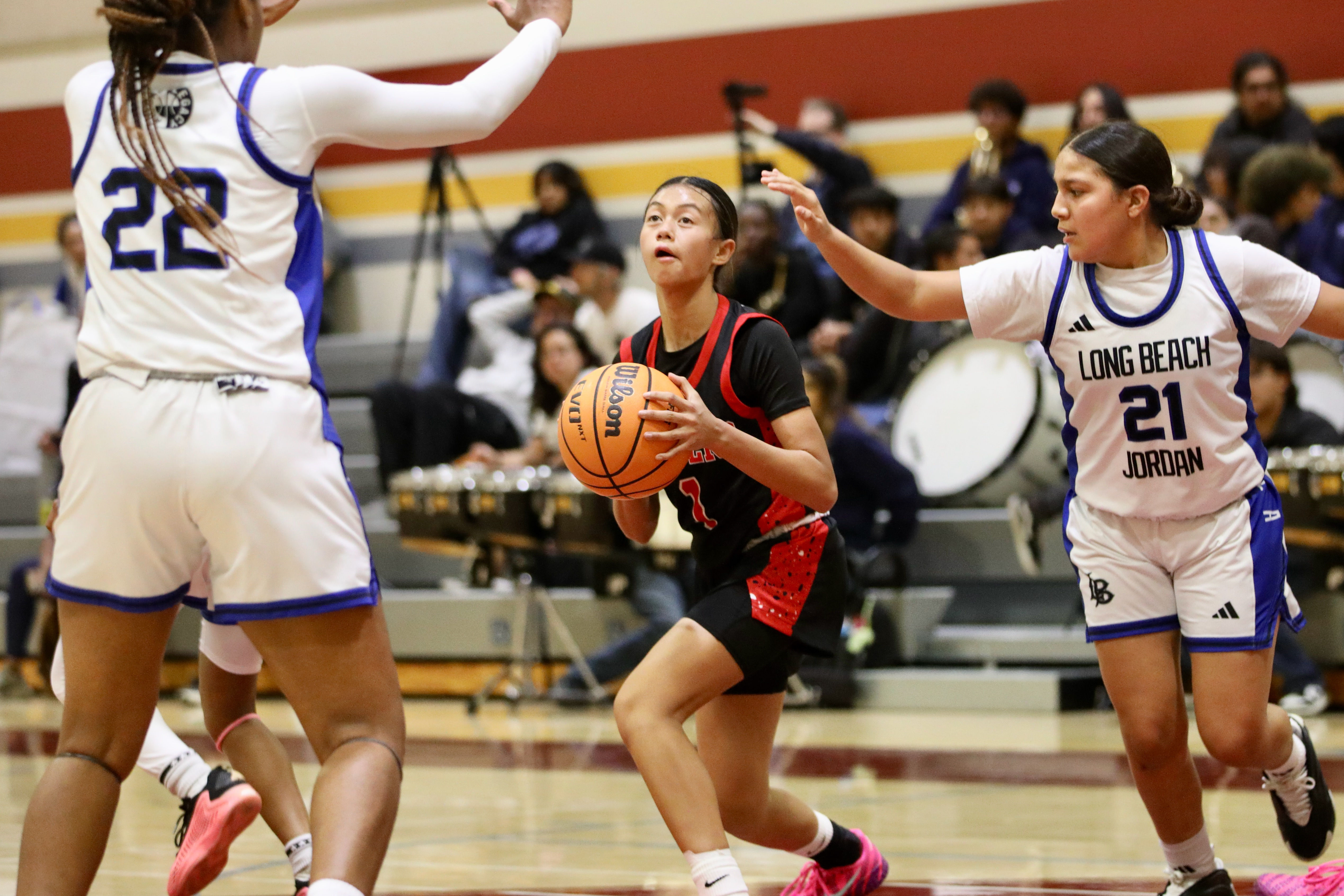 Lakewood freshman guard Leilah Sieng looks to get a shot...