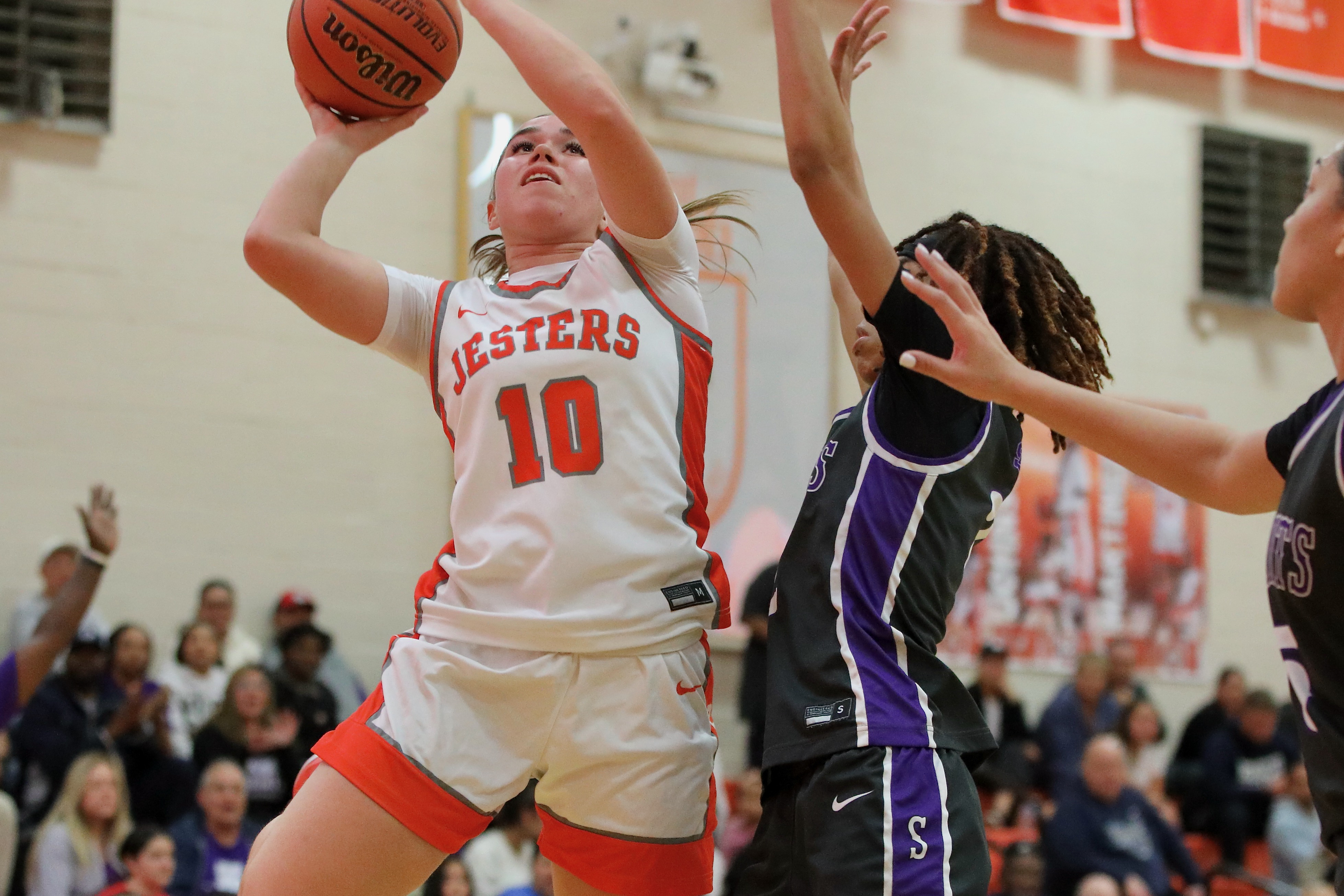 St. Joseph’s Mia Minshall shoots over St. Anthonyâs Lailah Hughes...