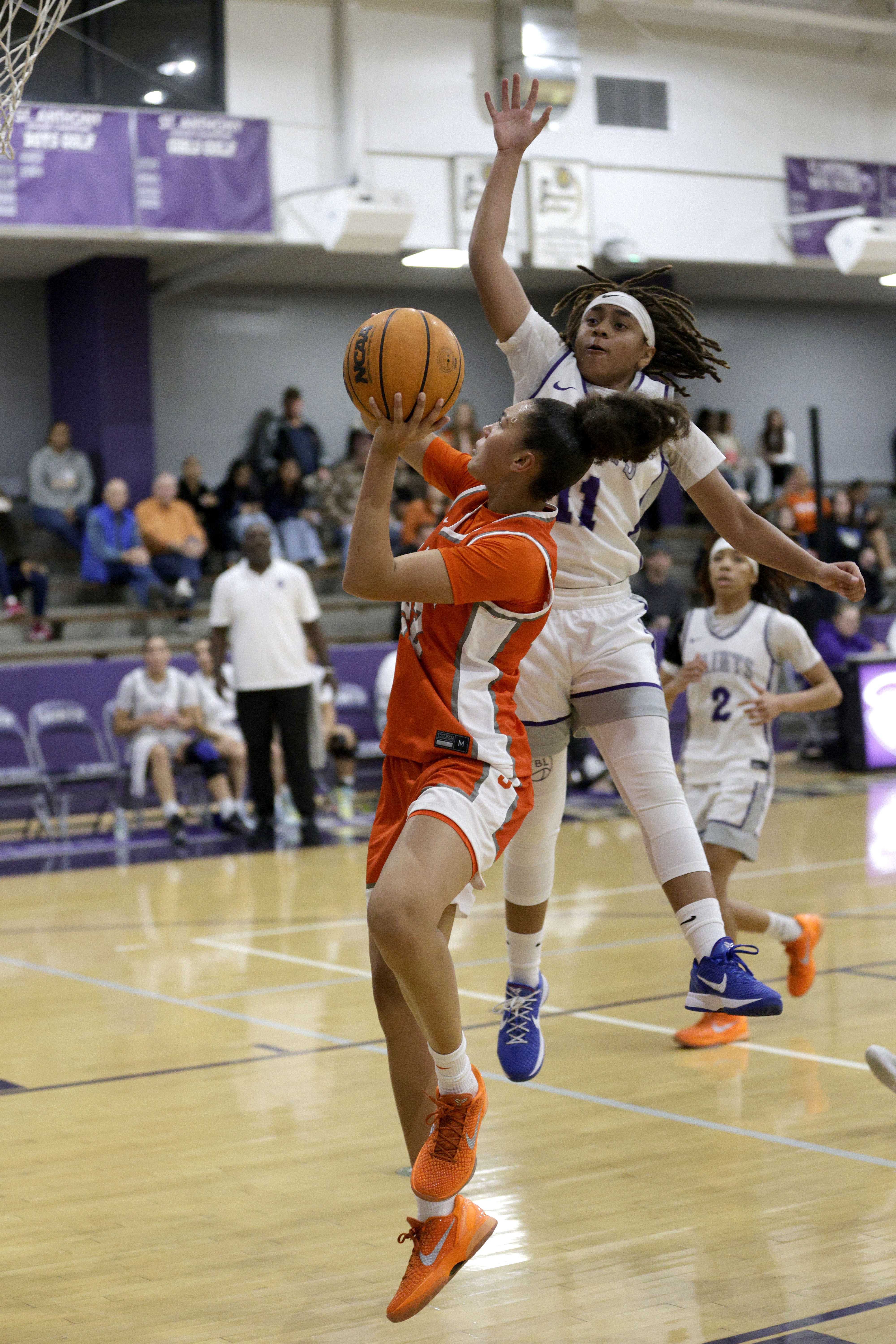 St. Anthonys Jordyn Washington (11) jumps up to block St....