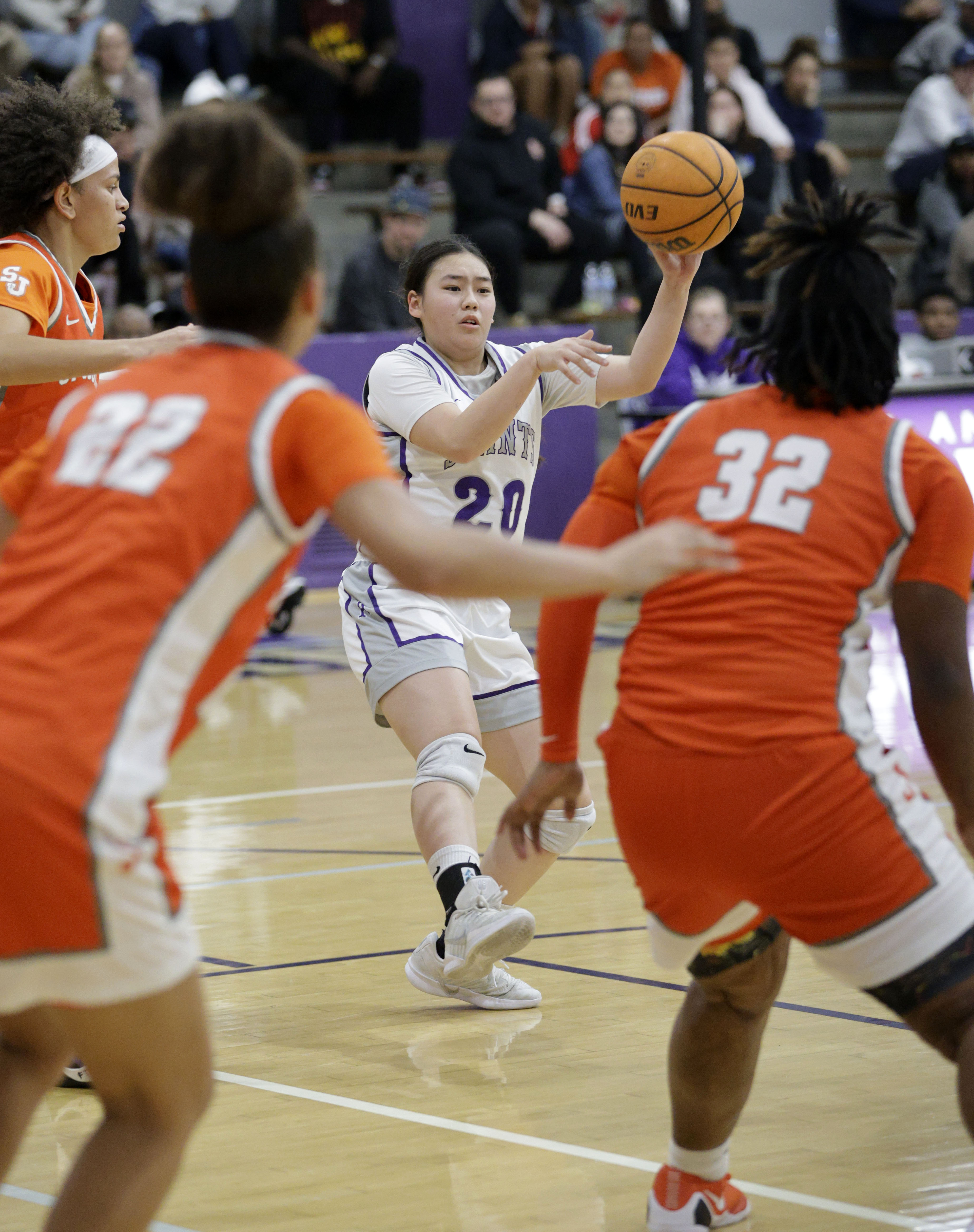 St. Anthonys Ayaka Yiu (20) looks for an open teammate...