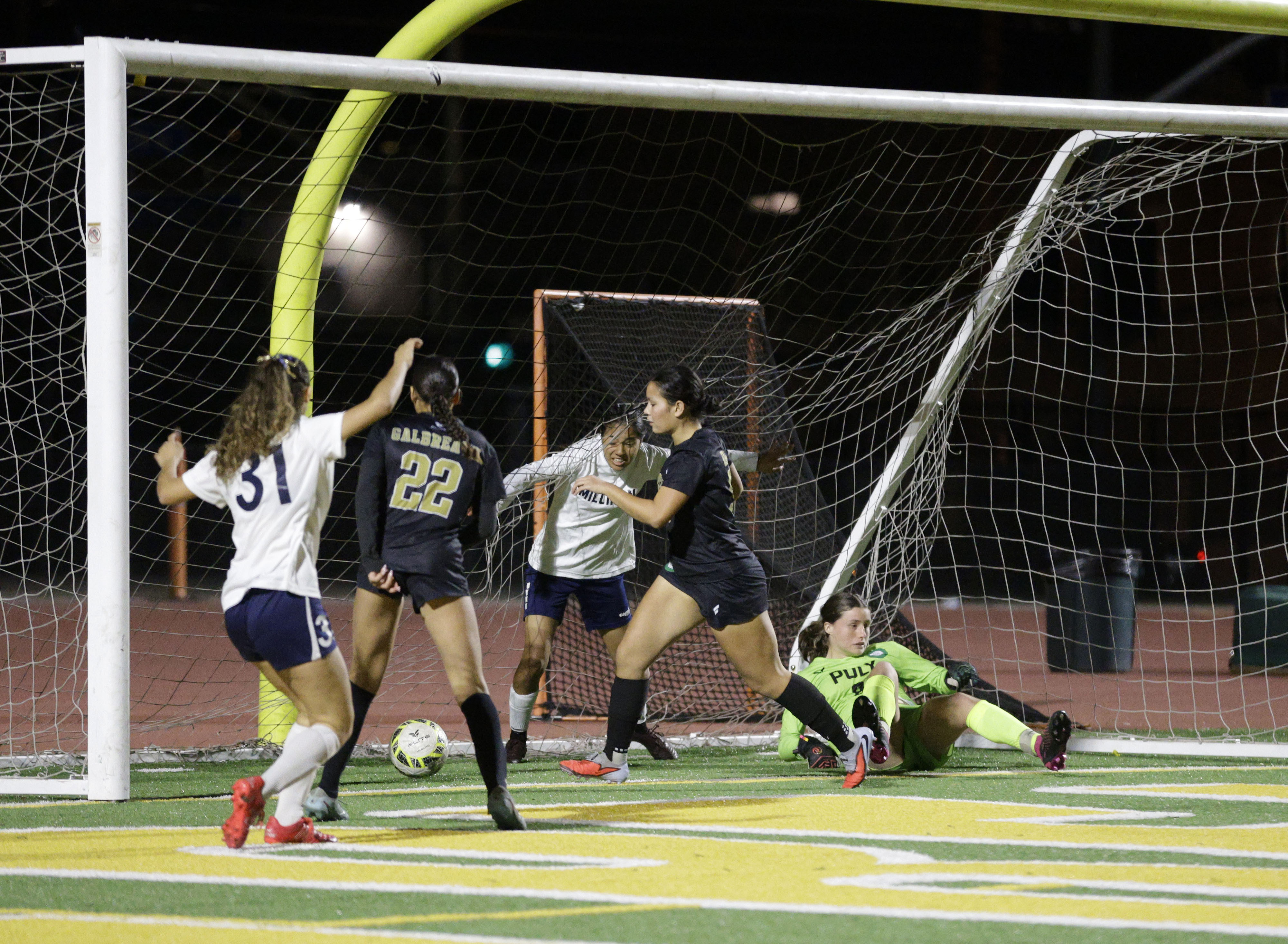 Long Beach Poly goalie Zadie Kuykendal (8) canât stop Millikan...