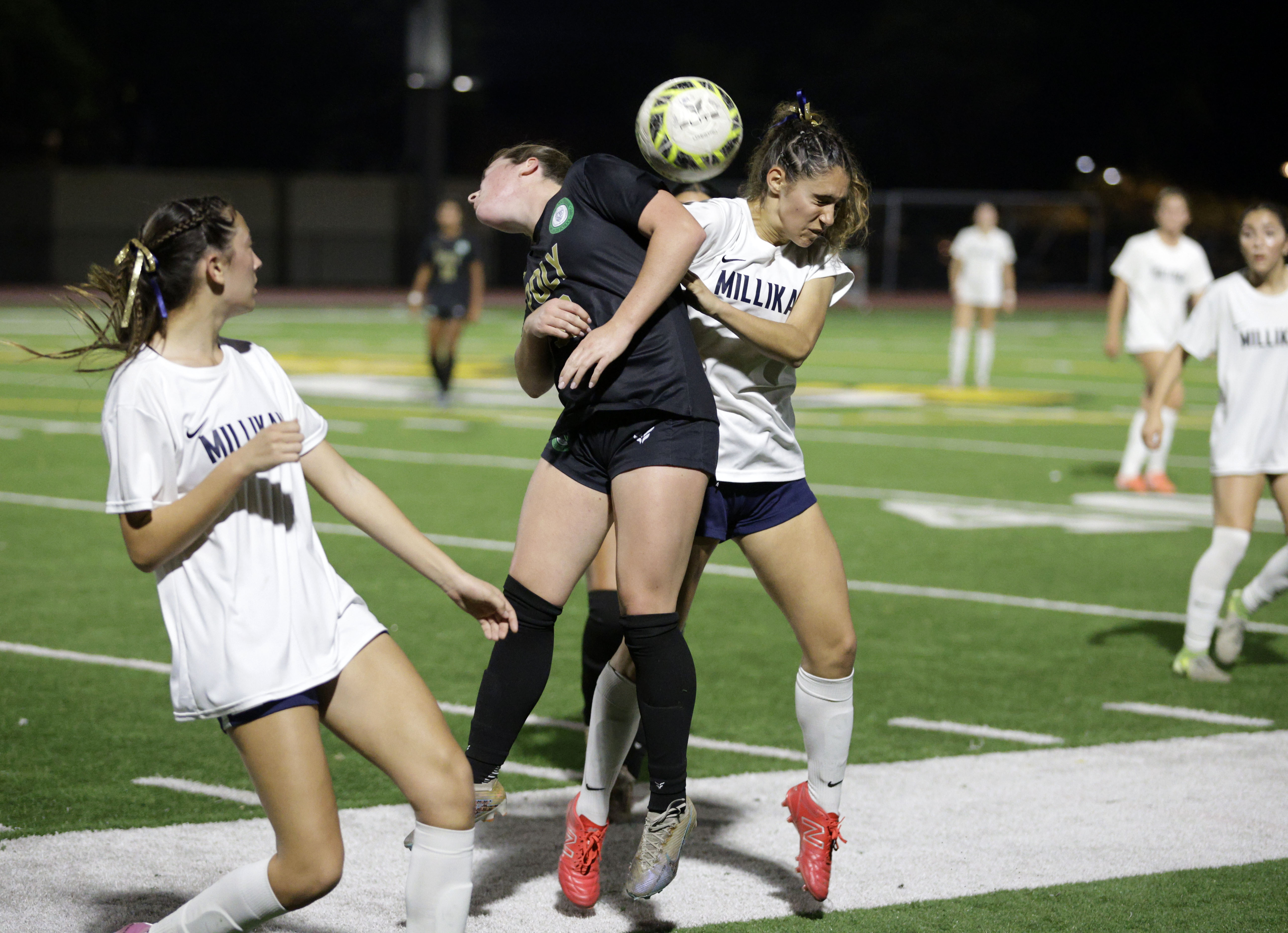 Long Beach Poly’s Maired Mcgovern (10) and Millikans Elle Aoun...