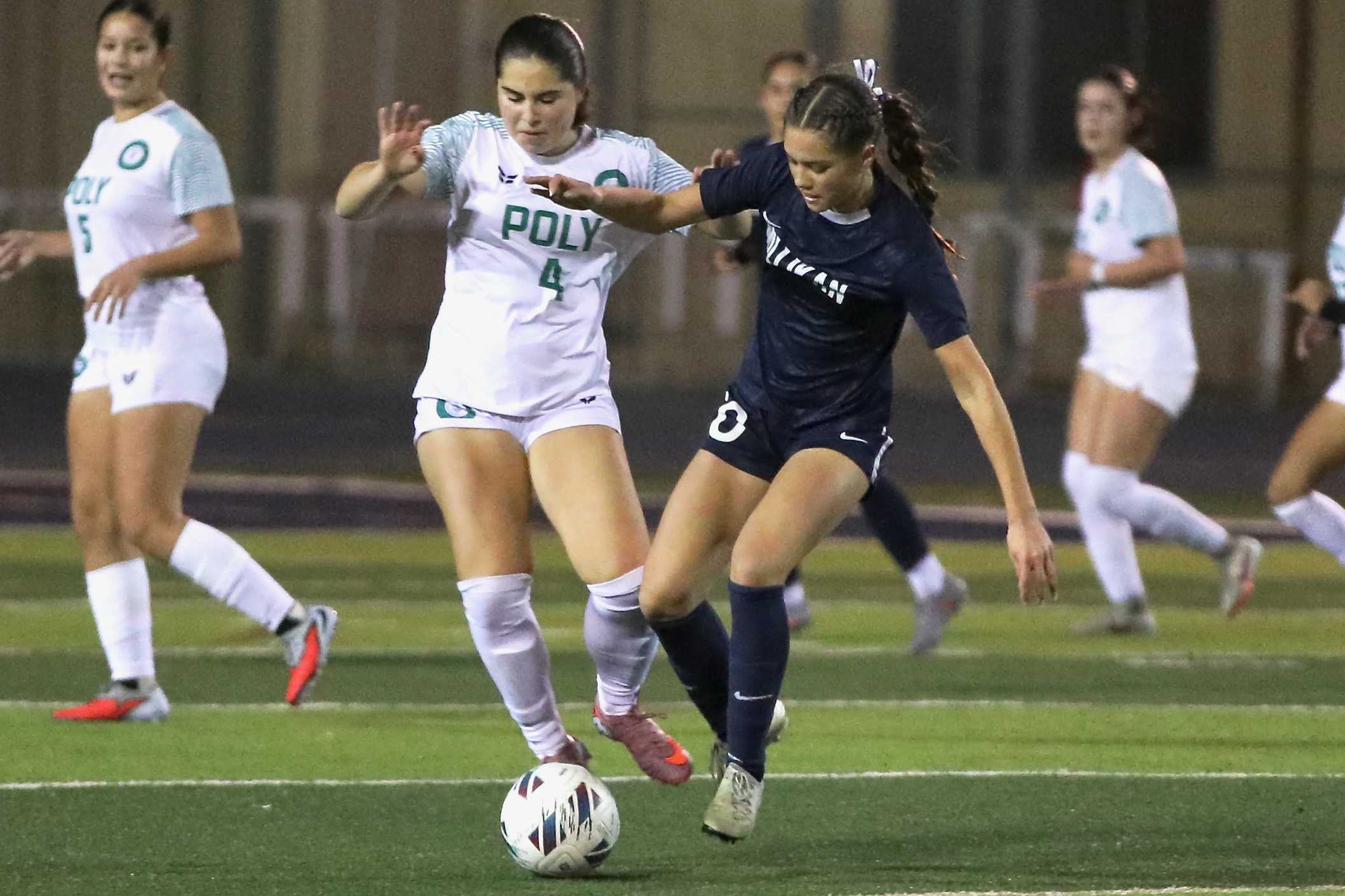 Long Beach Polyâs Lily Montecinos, left, and Millikanâs Ellie Carungcong...
