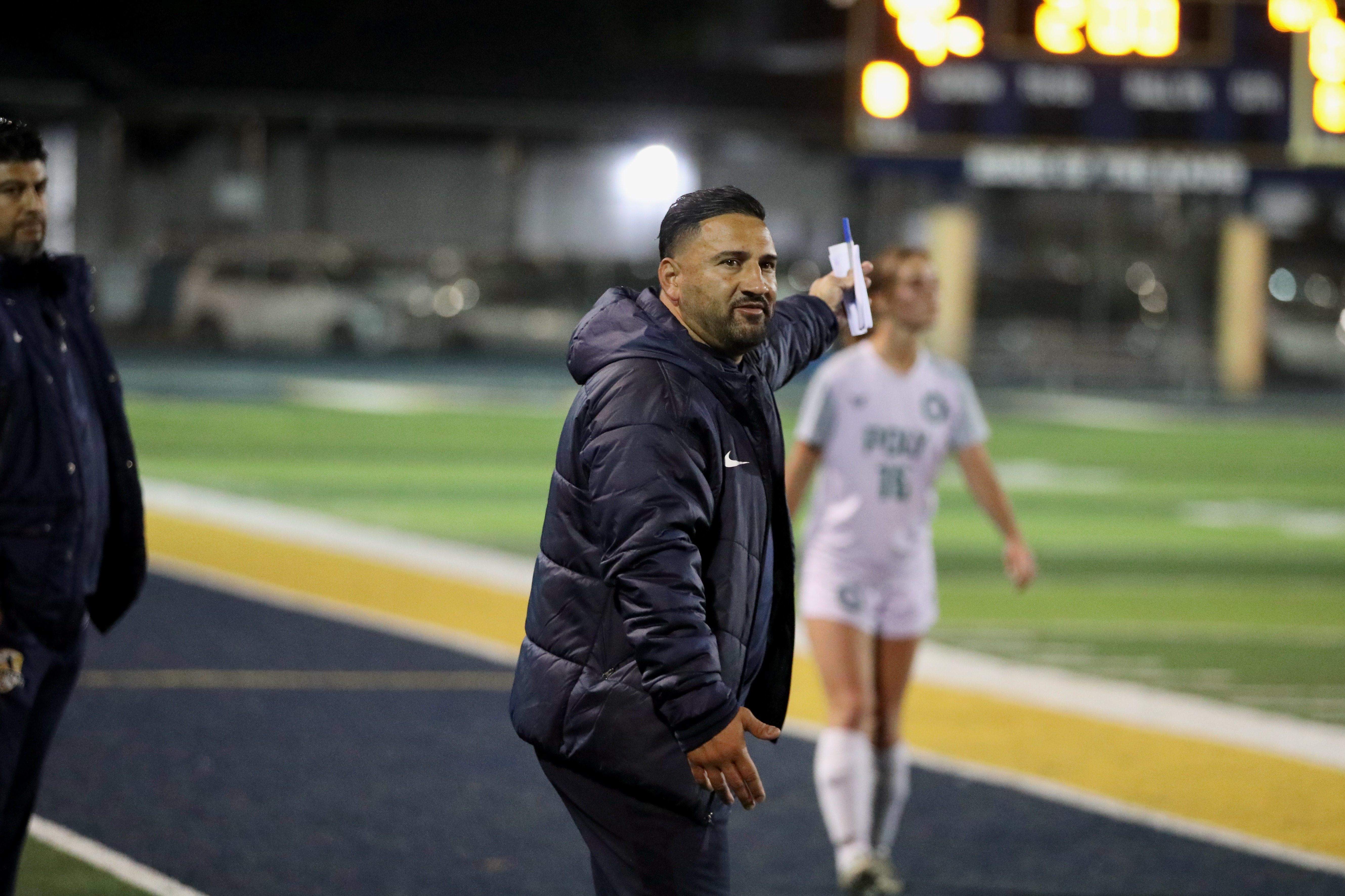 Millikan head coach Tino Nunez directs play in girls soccer...