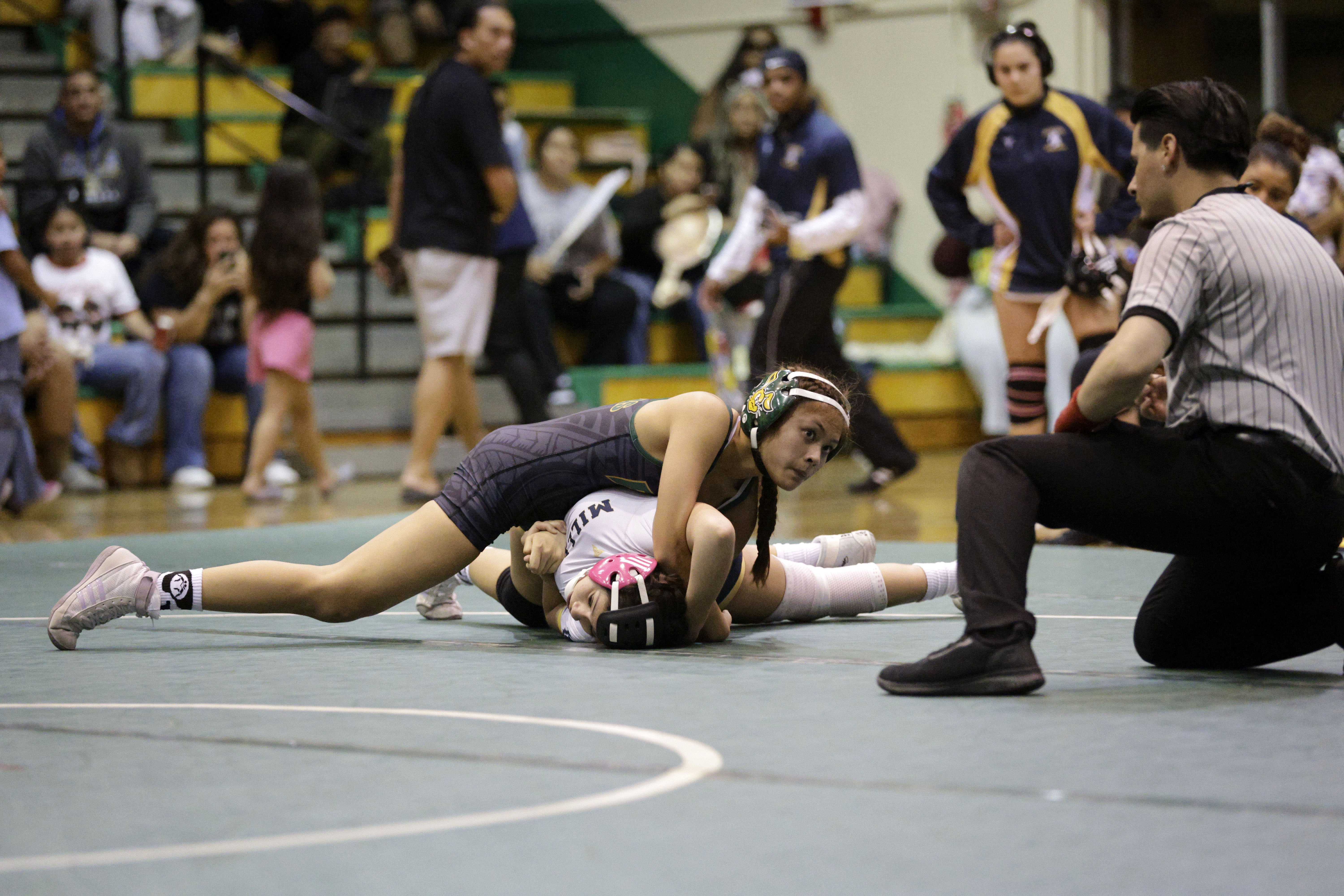 Long Beach Poly’s Riley Pestanas takes on Millikan’s Natalie Curioso...