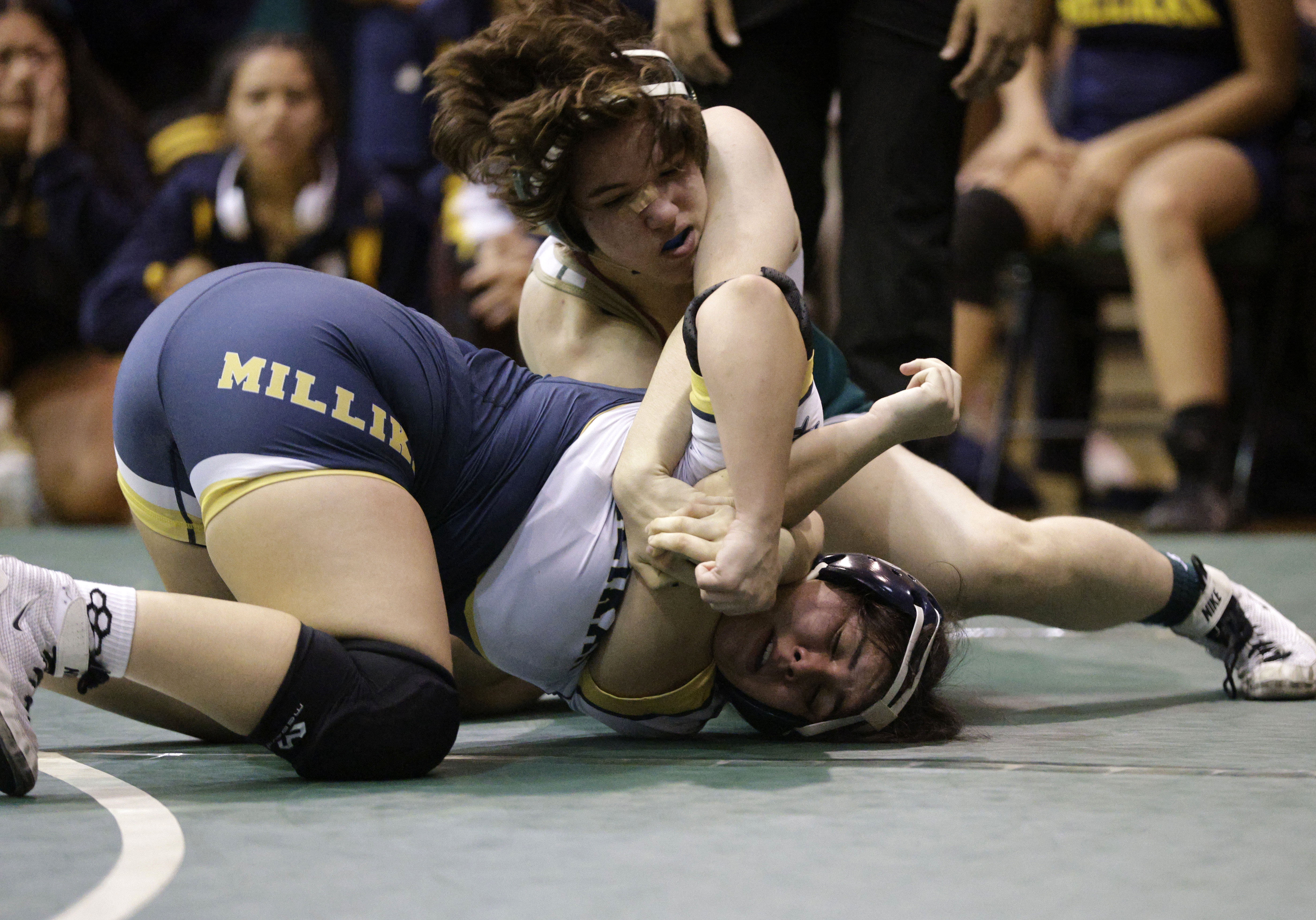 Long Beach Poly’s Devyn Kripp takes on Millikan’s Gabriela Bonilla...