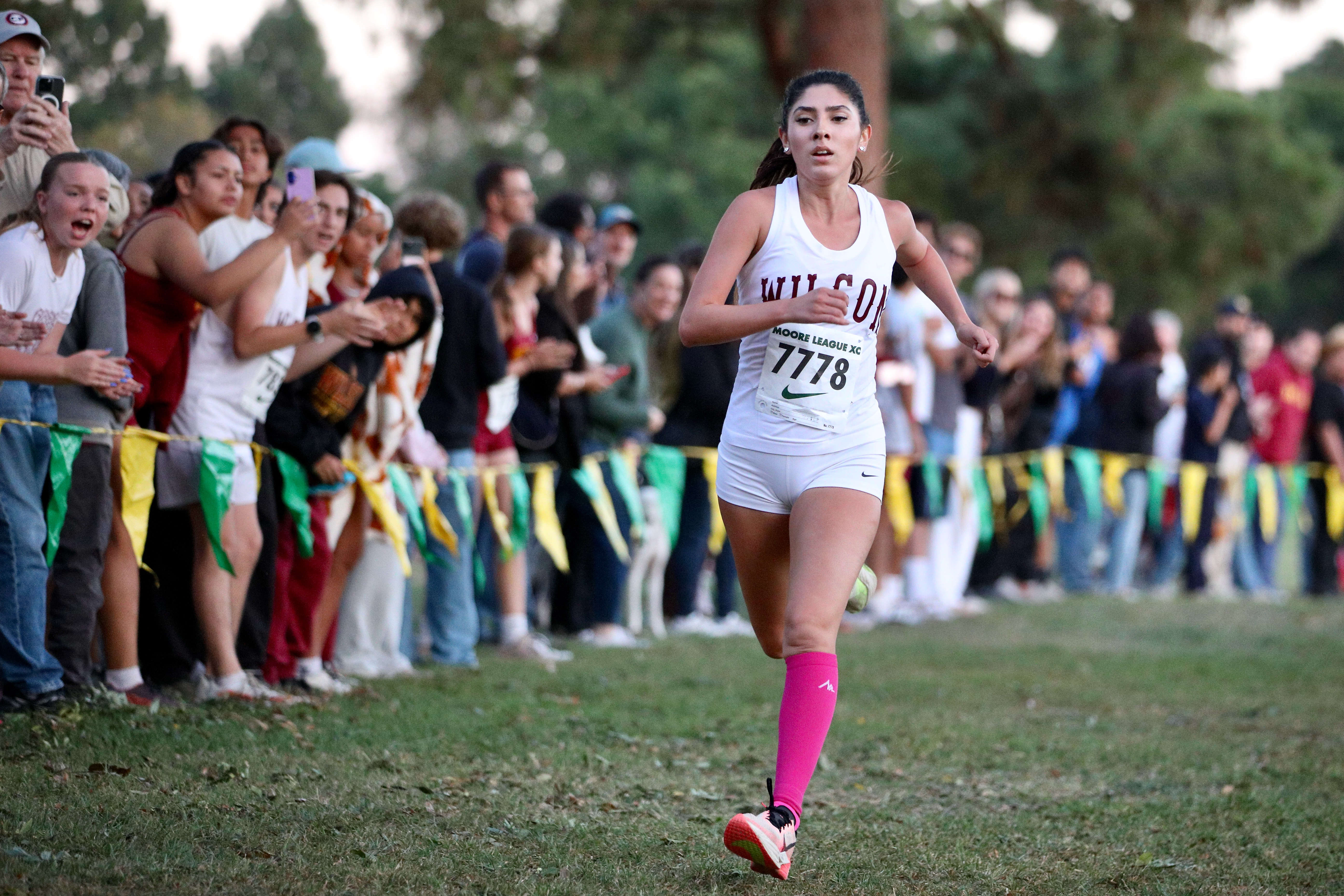 Wilsonâs Nadia Mejia wins the girls Moore League cross country...
