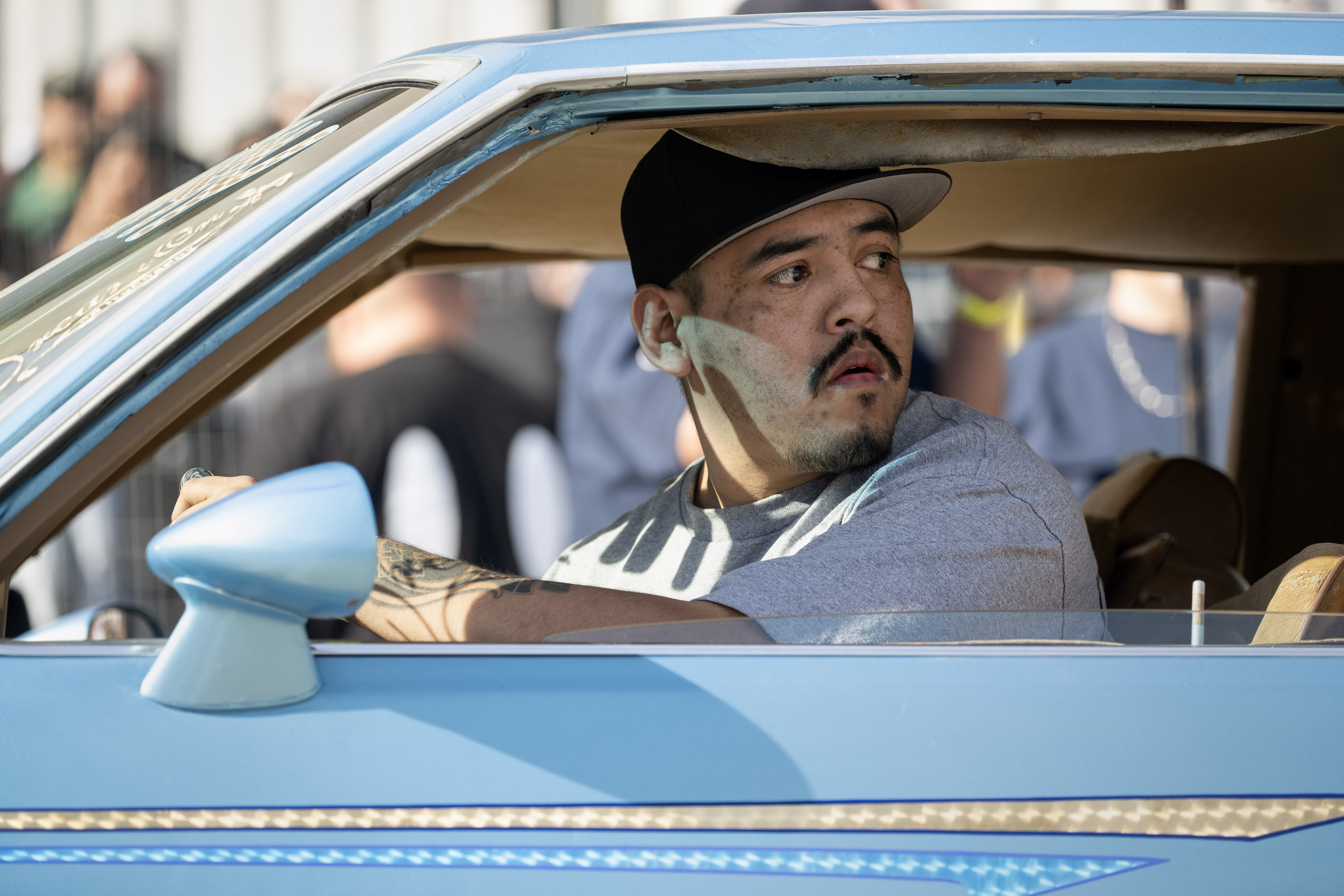 Julio Villanueva competes with his modified 1988 Oldsmobile Cutlass in...