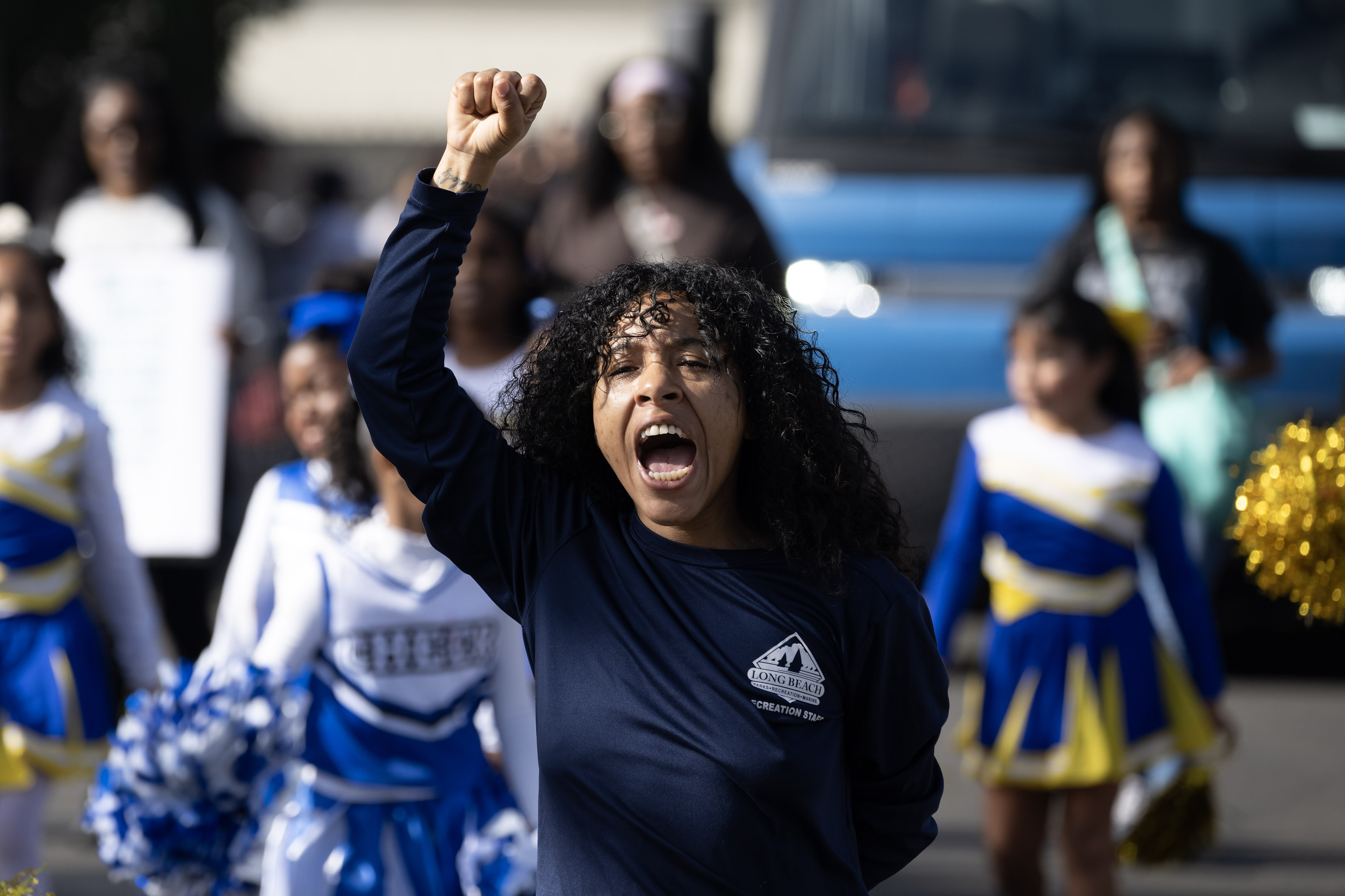 Coach Ashley Spidle walks with the Burbank Wrap Stars in...
