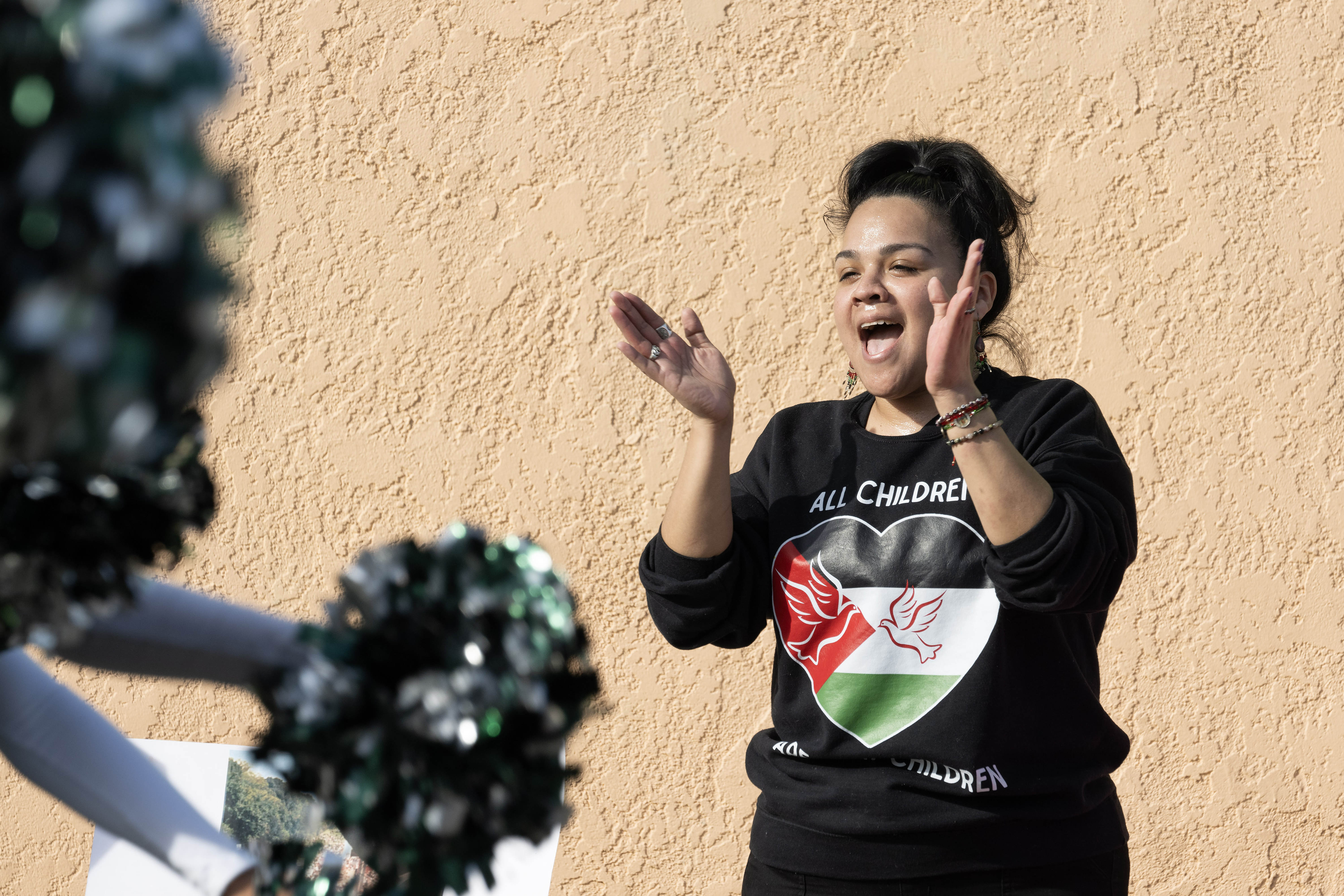 Ana Espinoza cheers during the 38th Annual Martin Luther King...