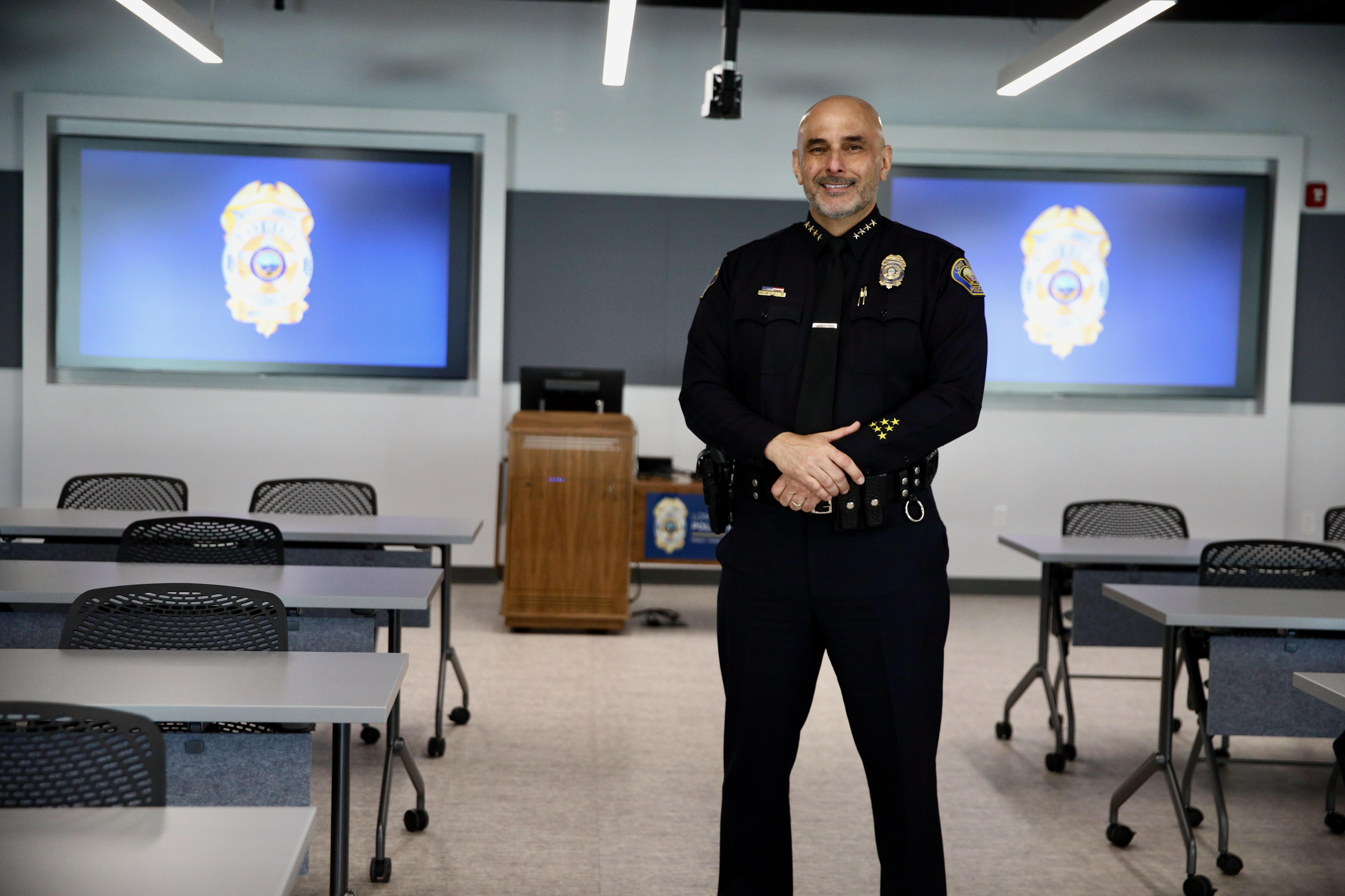 Police Chief Wally Hebeish poses inside a newly completed classroom...