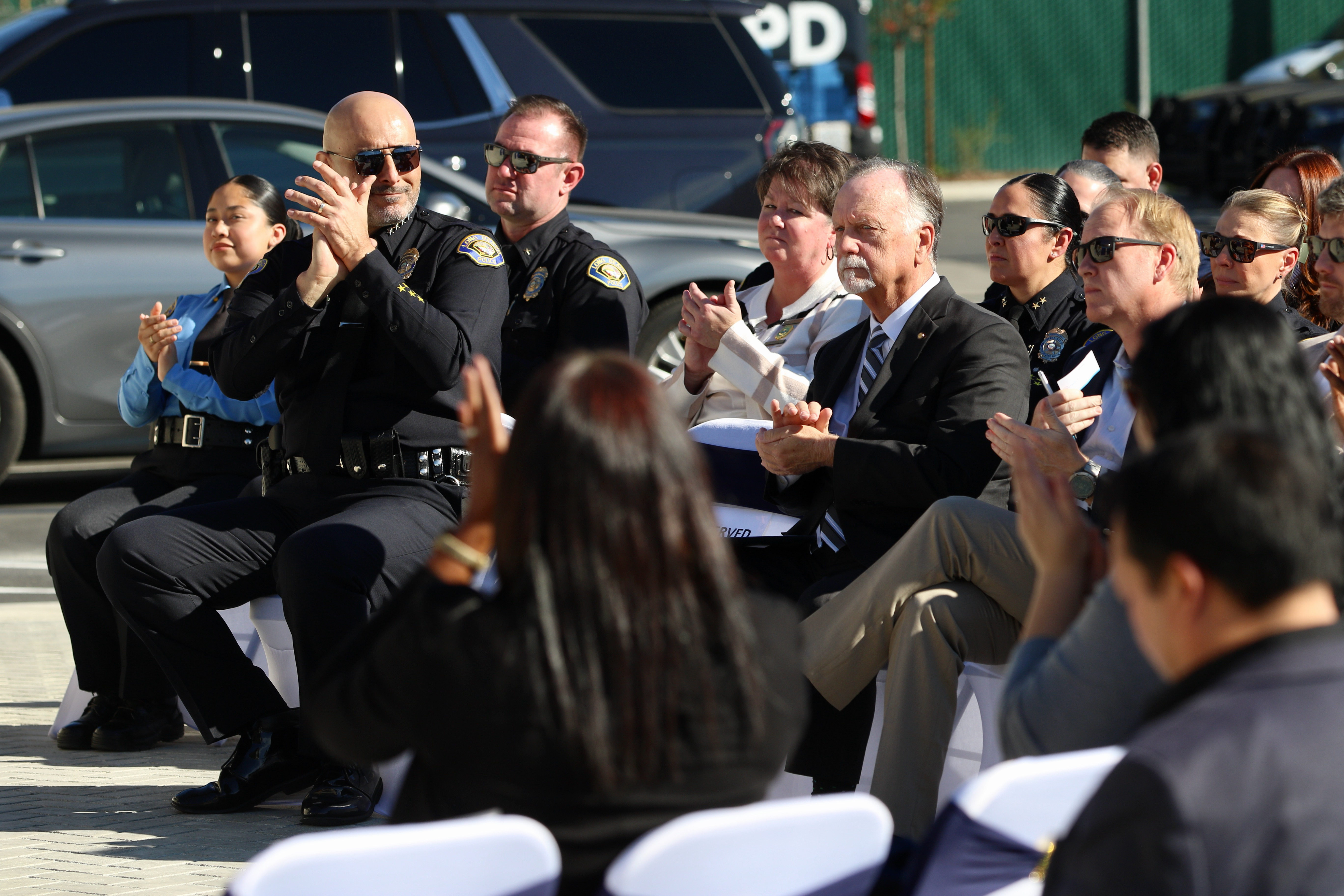 City officials attend the grand opening and ribbon-cutting of the...