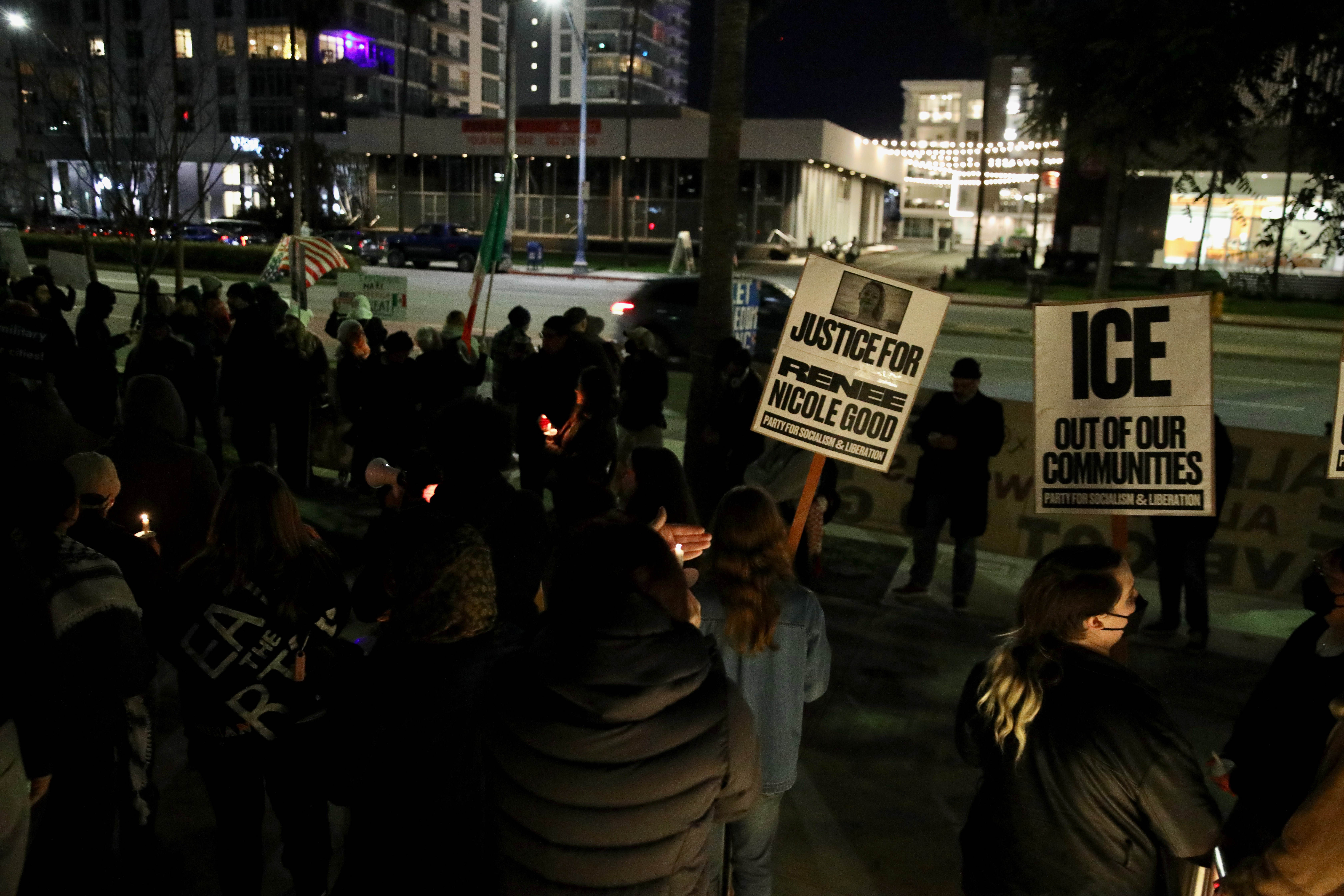 Protesters gather near Long Beach City Hall on Thursday evening,...