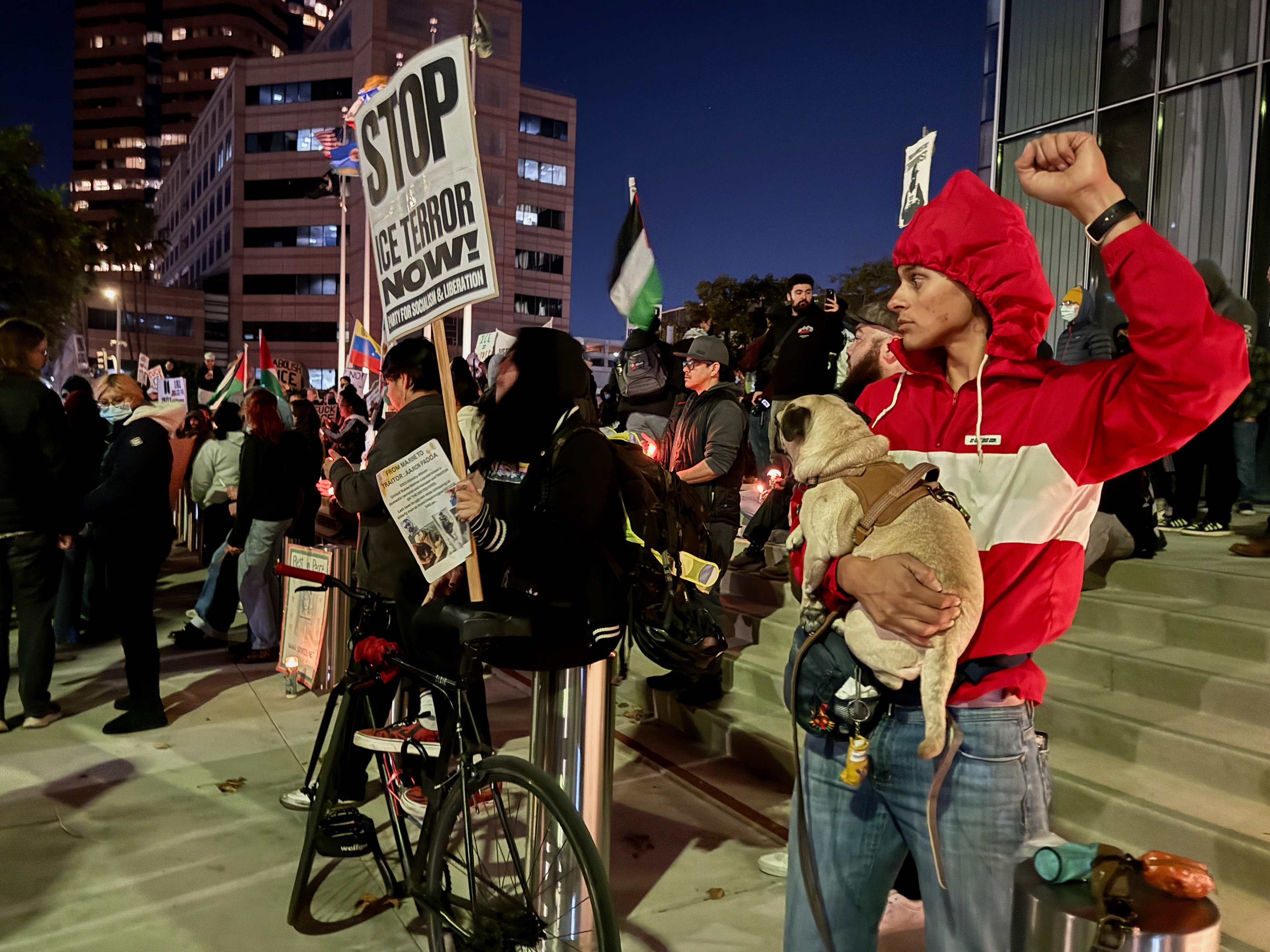 Protesters gather near Long Beach City Hall on Thursday evening,...
