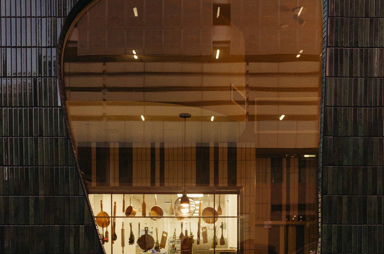 Looking into Lapaba from Sixth Street through a puddle-shaped window.