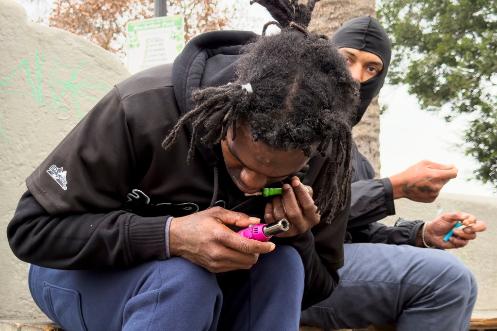 Homeless people at MacArthur Park in Los Angeles on December 23, 2025.
