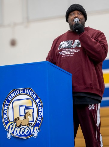 Grant Union High school principal, Dr. Darris Hinson, gives  a speech at Grant Union High School's gymnasium before the  Call to Action march in Del Paso Heights. Russell Stiger Jr., OBSERVER