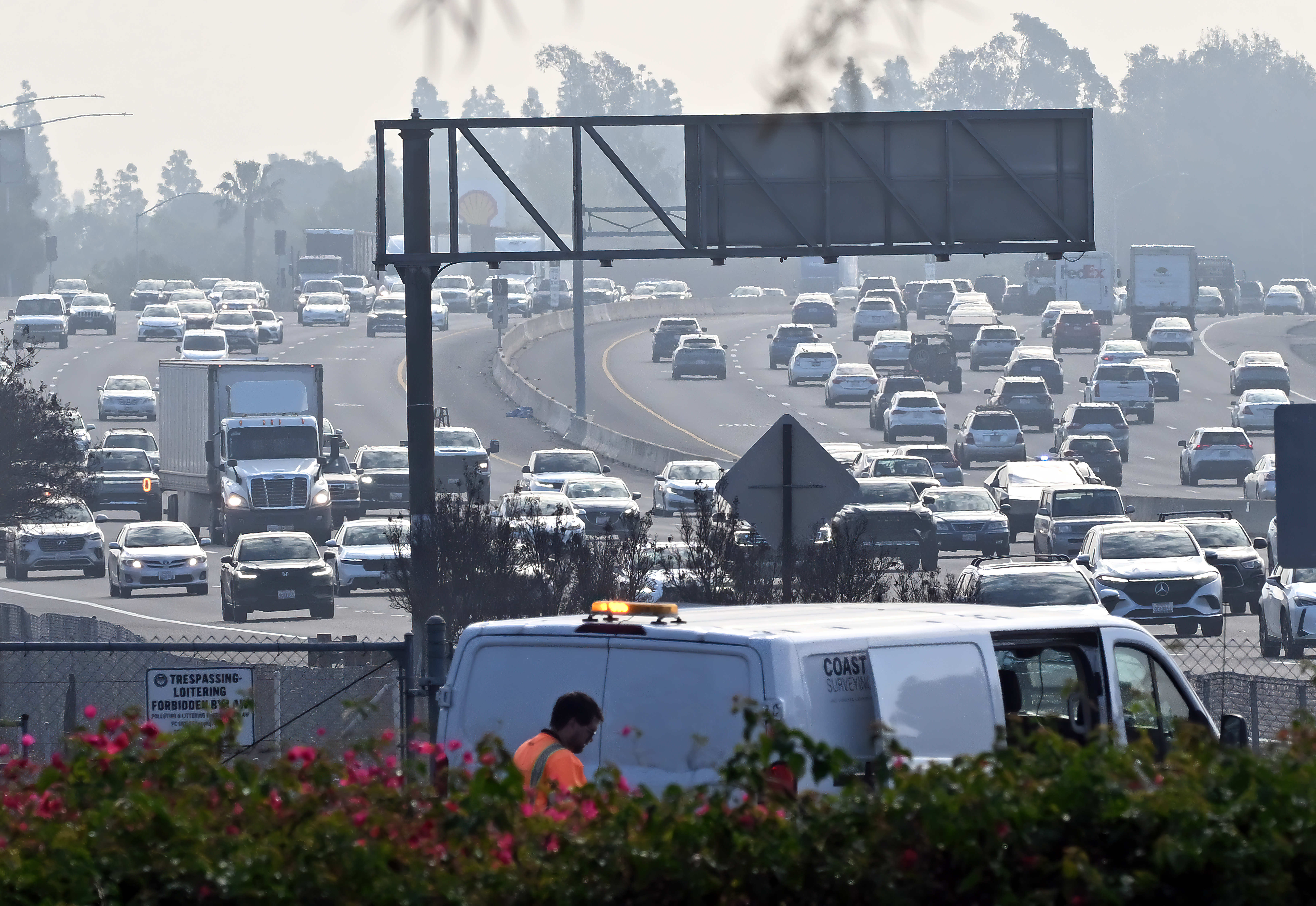 Cars drive down Interstate 5 near Culver Dr. in Irvine,...