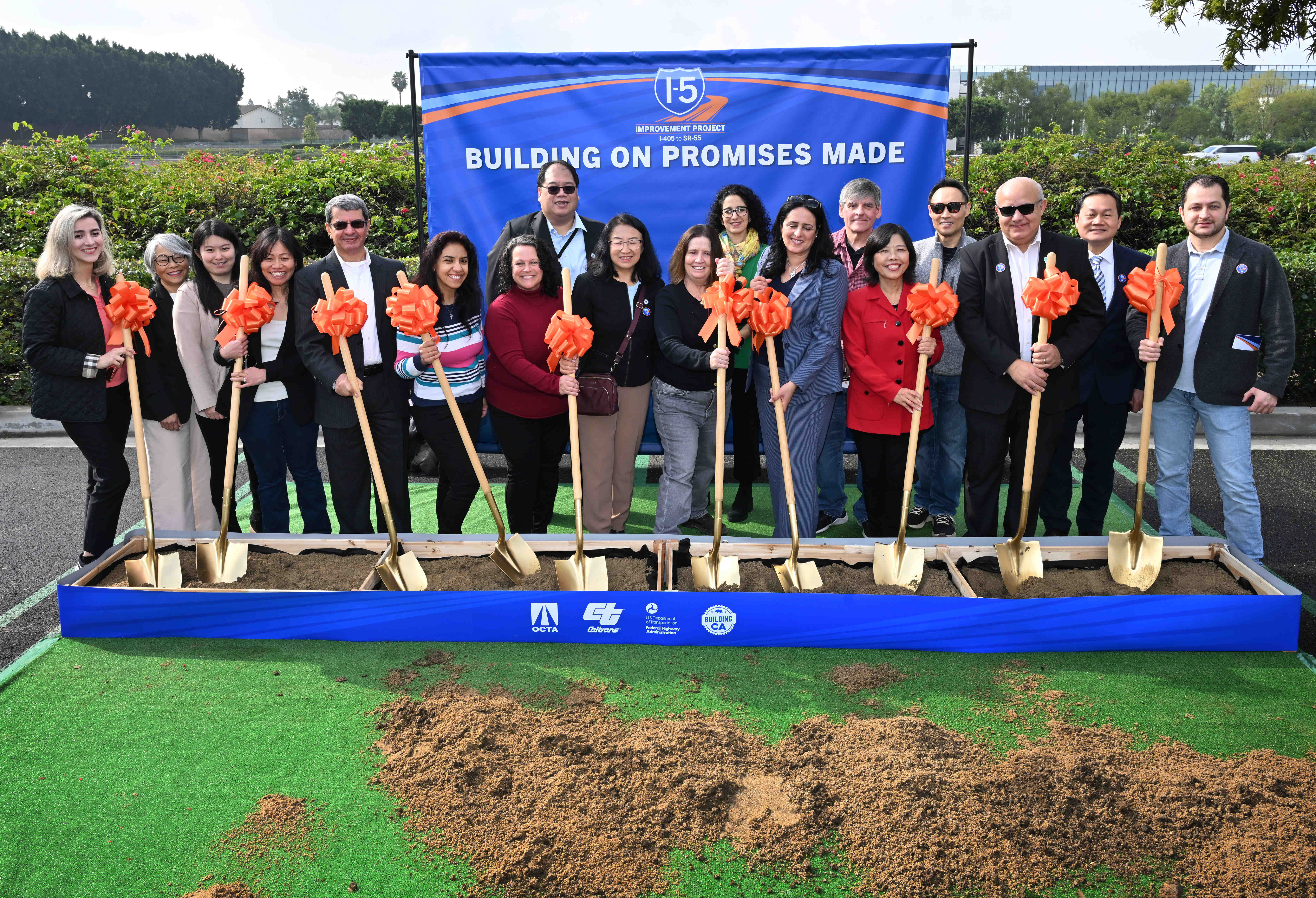 Caltrans representatives with shovels during a ground breaking ceremony on...