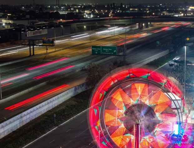 A Ferris wheel spins at a pumpkin patch west of the 405 Freeway in the parking lot of the Westminster Mall in November. (Photo by Jeff Gritchen, Orange County Register/SCNG)