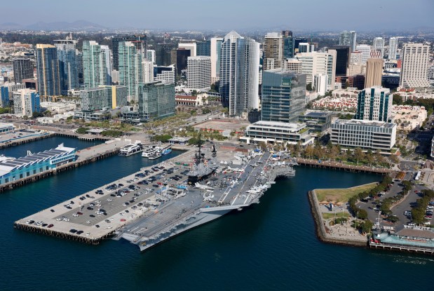 The USS Midway Museumare and downtown is seen along San Diego Bay on October 7, 2025 in San Diego, CA. (K.C. Alfred / The San Diego Union-Tribune)