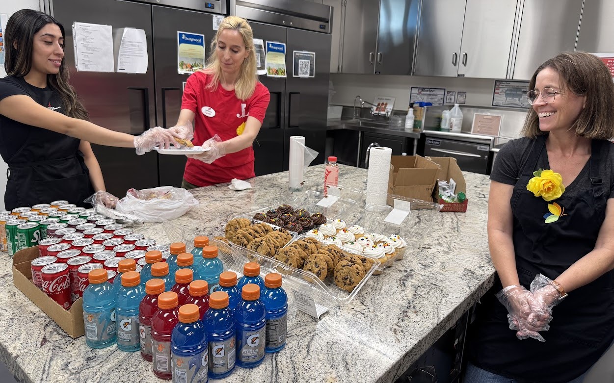 Members of the Junior League of Orange County, California volunteer...