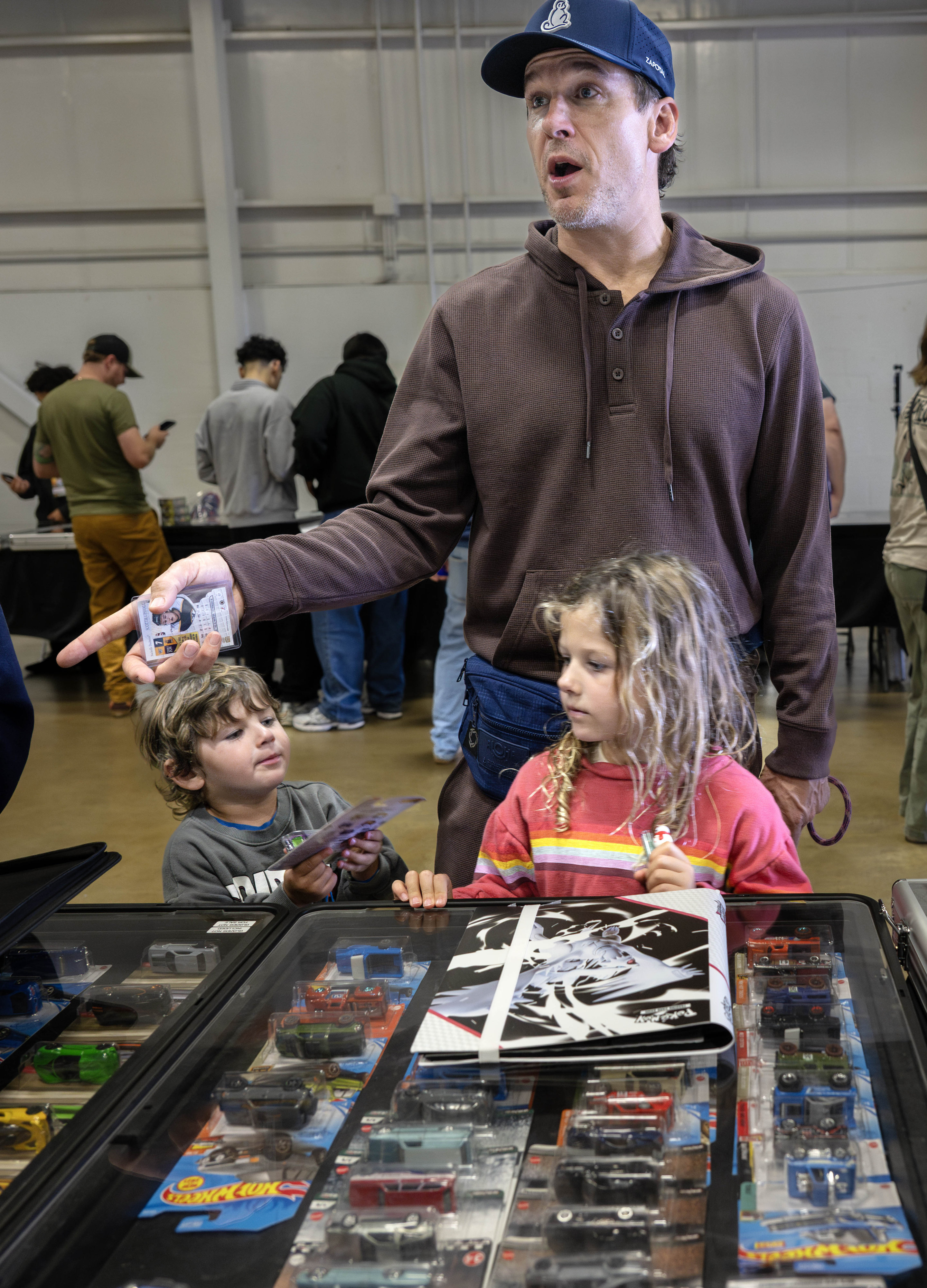 Former NHL hockey player, Scottie Upshall, with his son, Beckman,...