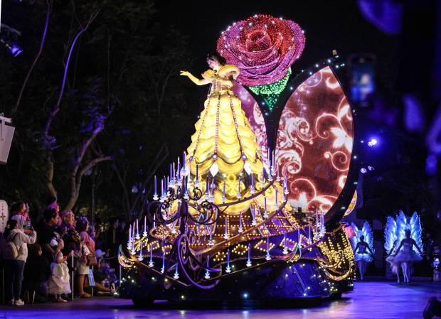 The Paint the Night Parade travels past It's a Small World at Disneyland in Anaheim, CA, on Wednesday, May 14, 2025. Disneyland is celebrating its 70th anniversary from May 16, 2025 through summer 2026.(Photo by Jeff Gritchen, Orange County Register/SCNG)