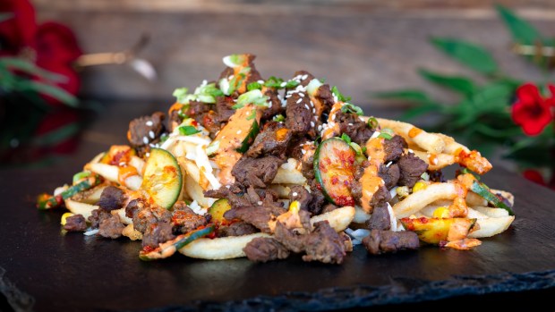 Bulgogi Fries available at Smokejumpers Grill and Paradise Garden Grill during the 2026 Lunar New Year food festival at Disney California Adventure. (Courtesy of Disneyland)