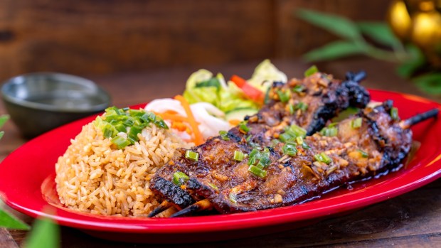 Grilled Lemongrass Pork Belly Skewers available at Paradise Garden Grill during the 2026 Lunar New Year food festival at Disney California Adventure. (Courtesy of Disneyland)