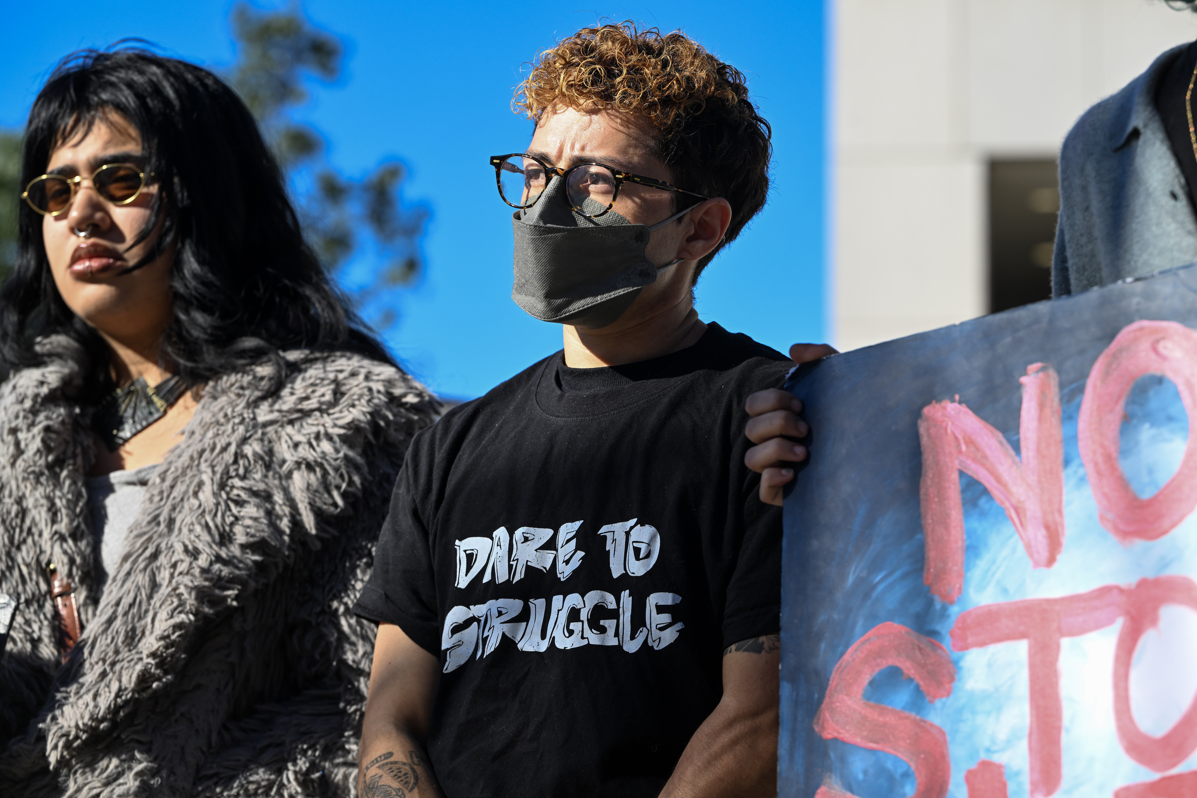 Skye Jones waits to speak during a press conference by...