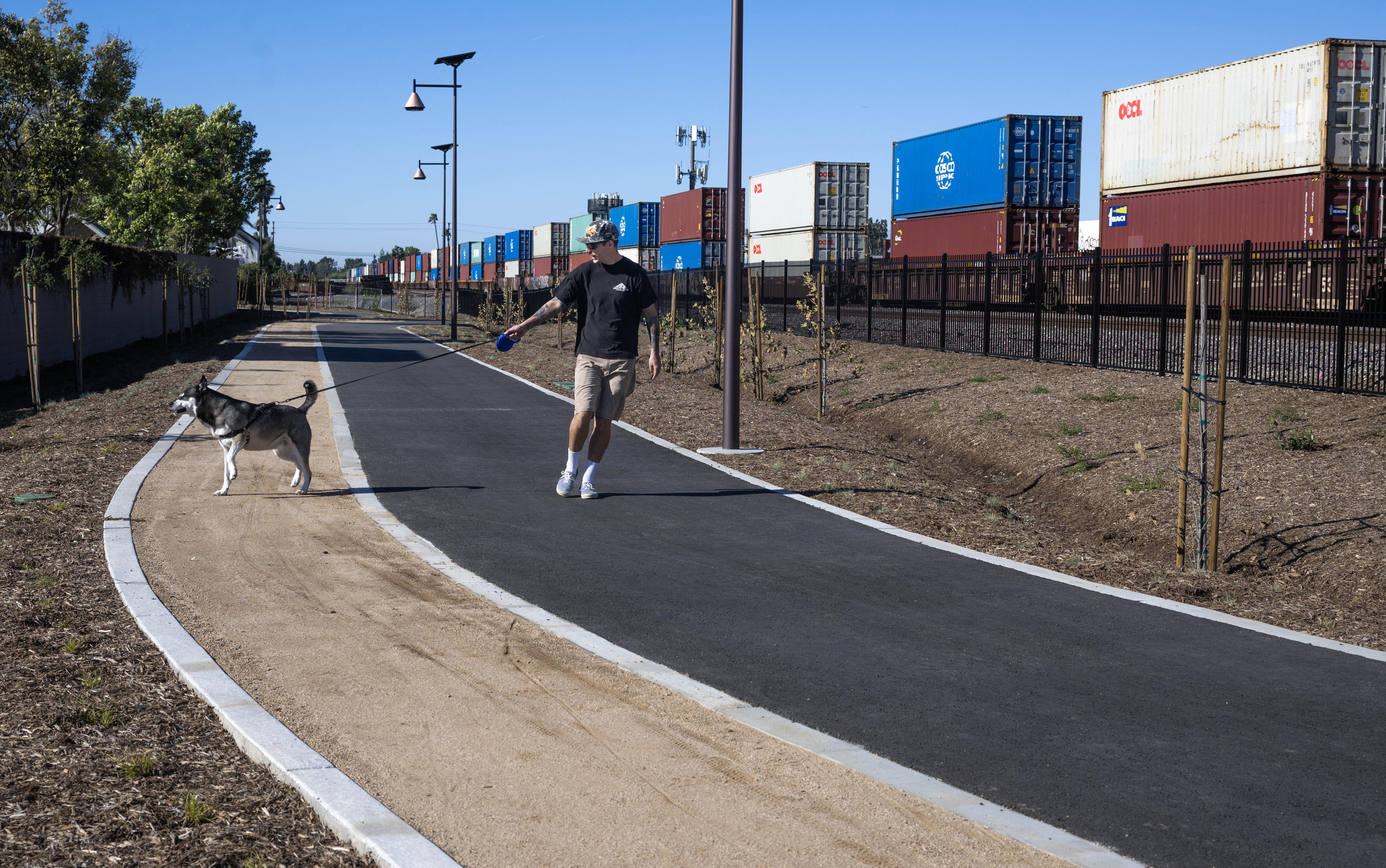 Brandon Bina of San Diego and his dog, Cash, enjoy...