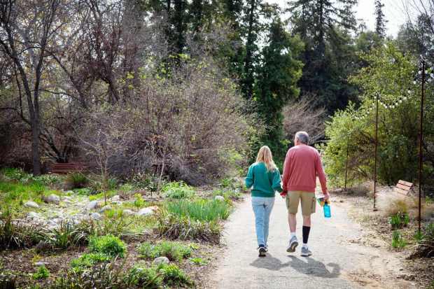 A couple walks along a trail during the Family Bird Festival on Sunday, Feb. 16, 2025, at the California Botanic Garden in Claremont. (Photo by Stan Lim, Contributing Photographer)