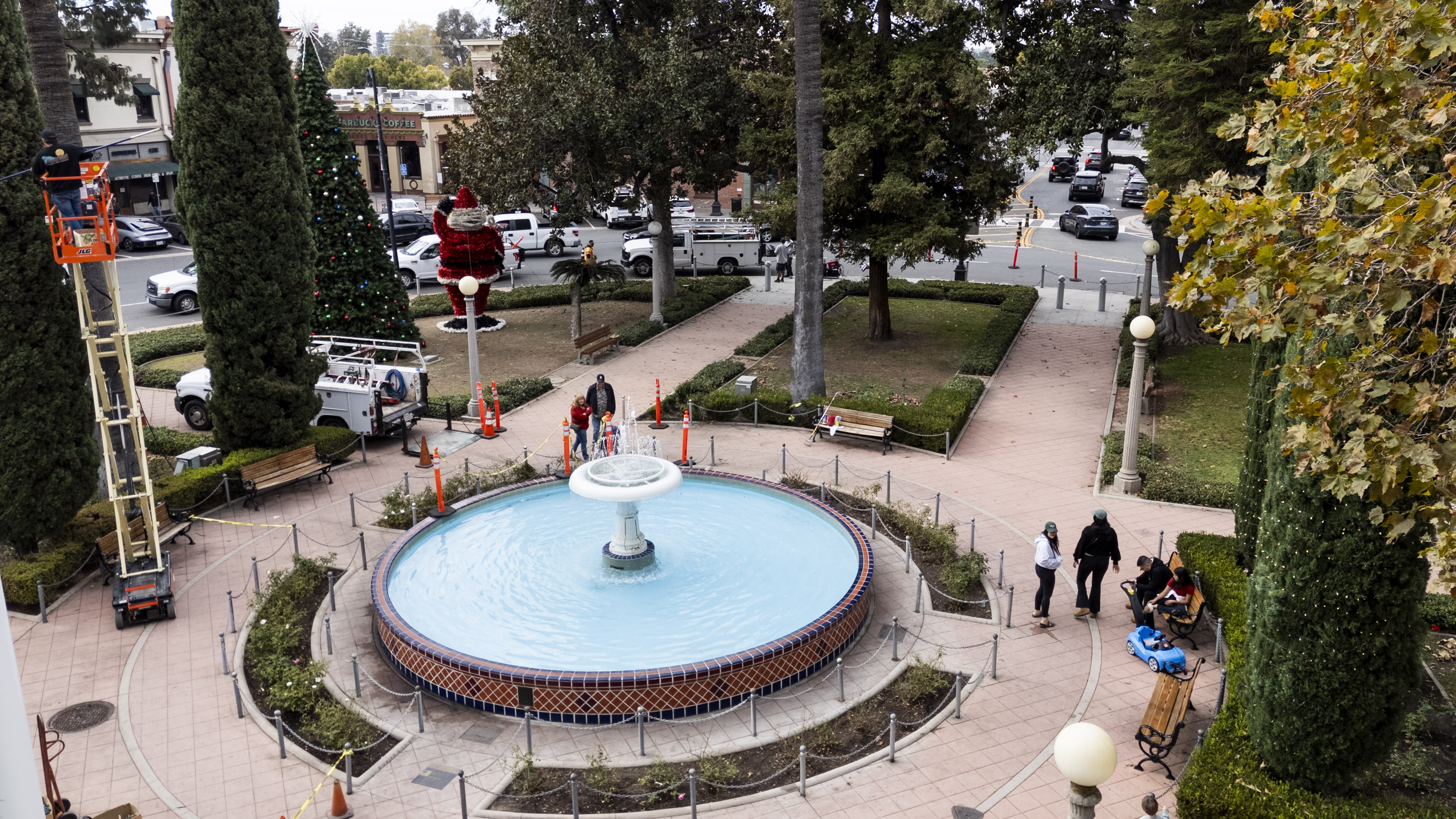 Crews repair damage to the Plaza Park fountain in Old...