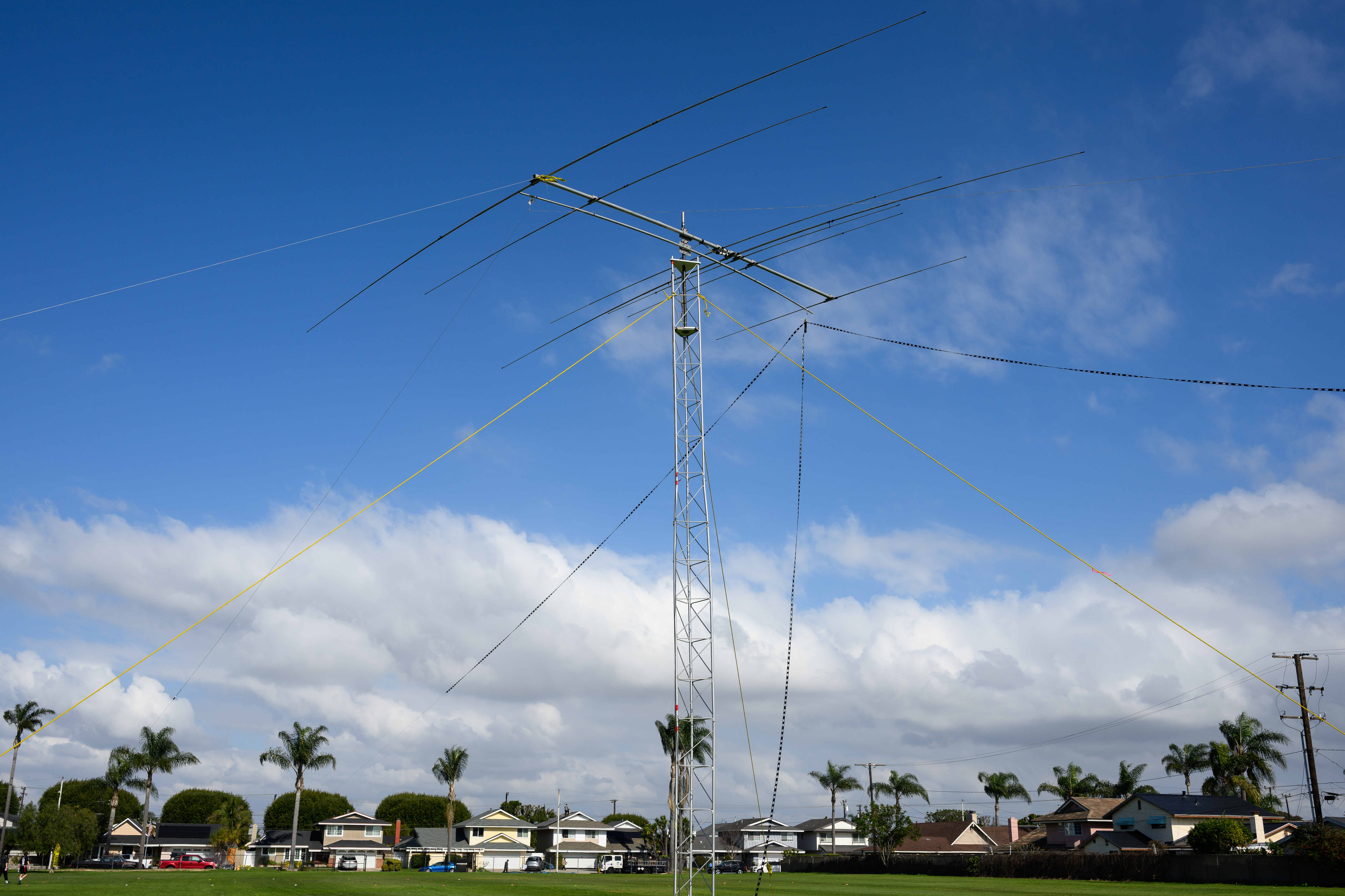 A 30-foot-high antenna is set up on a middle school...